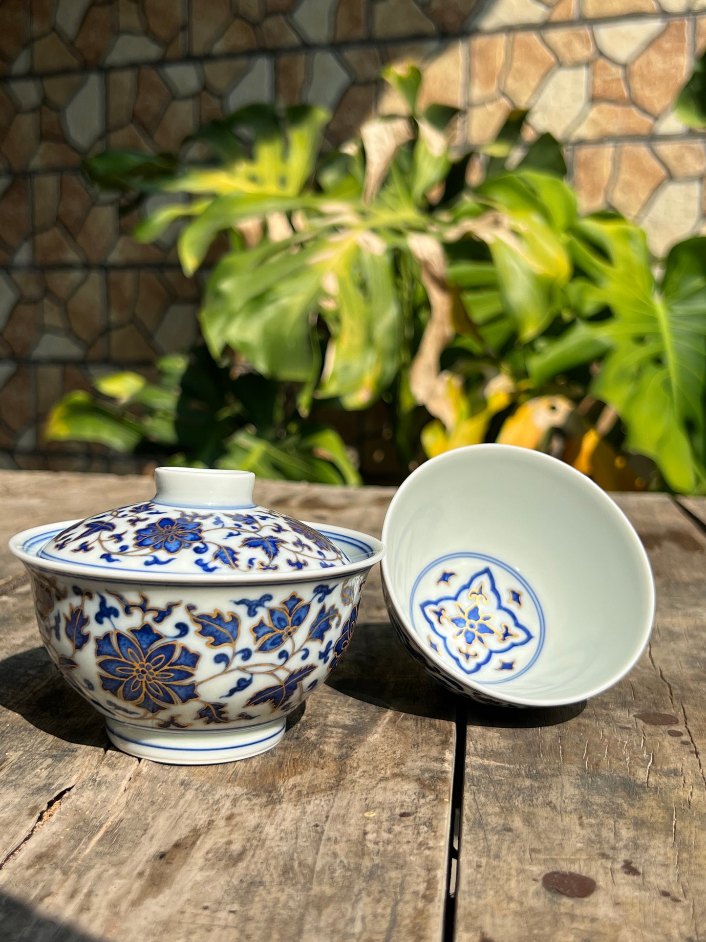 This is a Chinese Jingdezhen blue and white porcelain flower teapot gaiwan