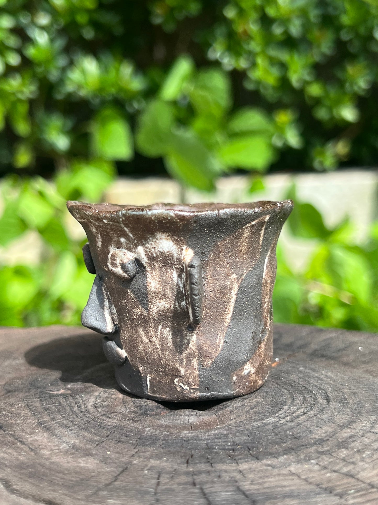 This is a pottery teacup