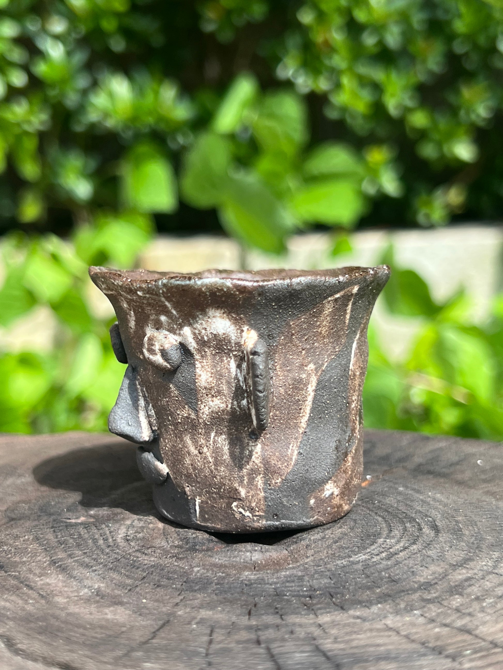 This is a pottery teacup