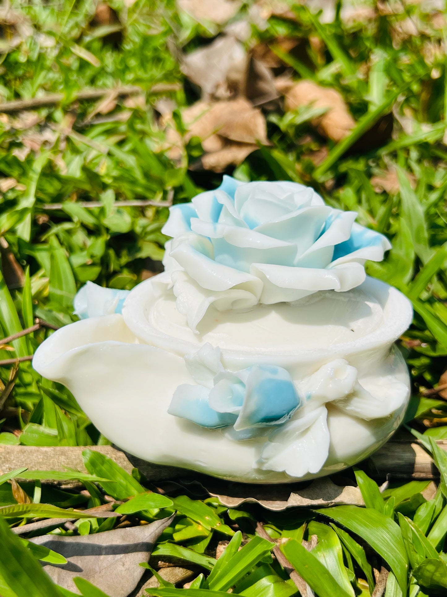 this is a woodfired white fine pottery flower teacup