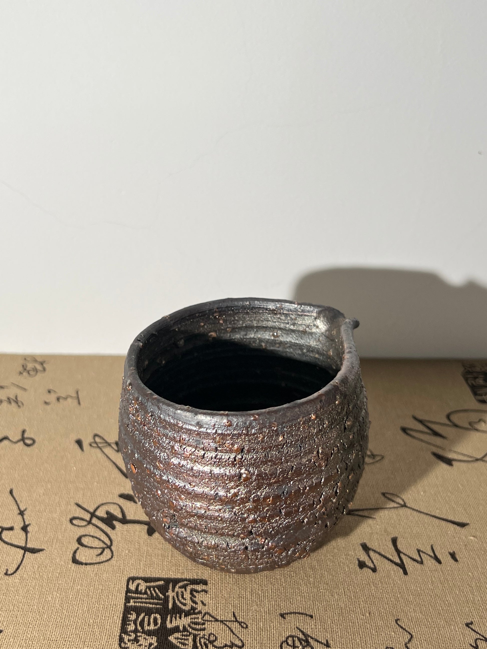 This is a woodfired tietai pottery faircup gongdaobei