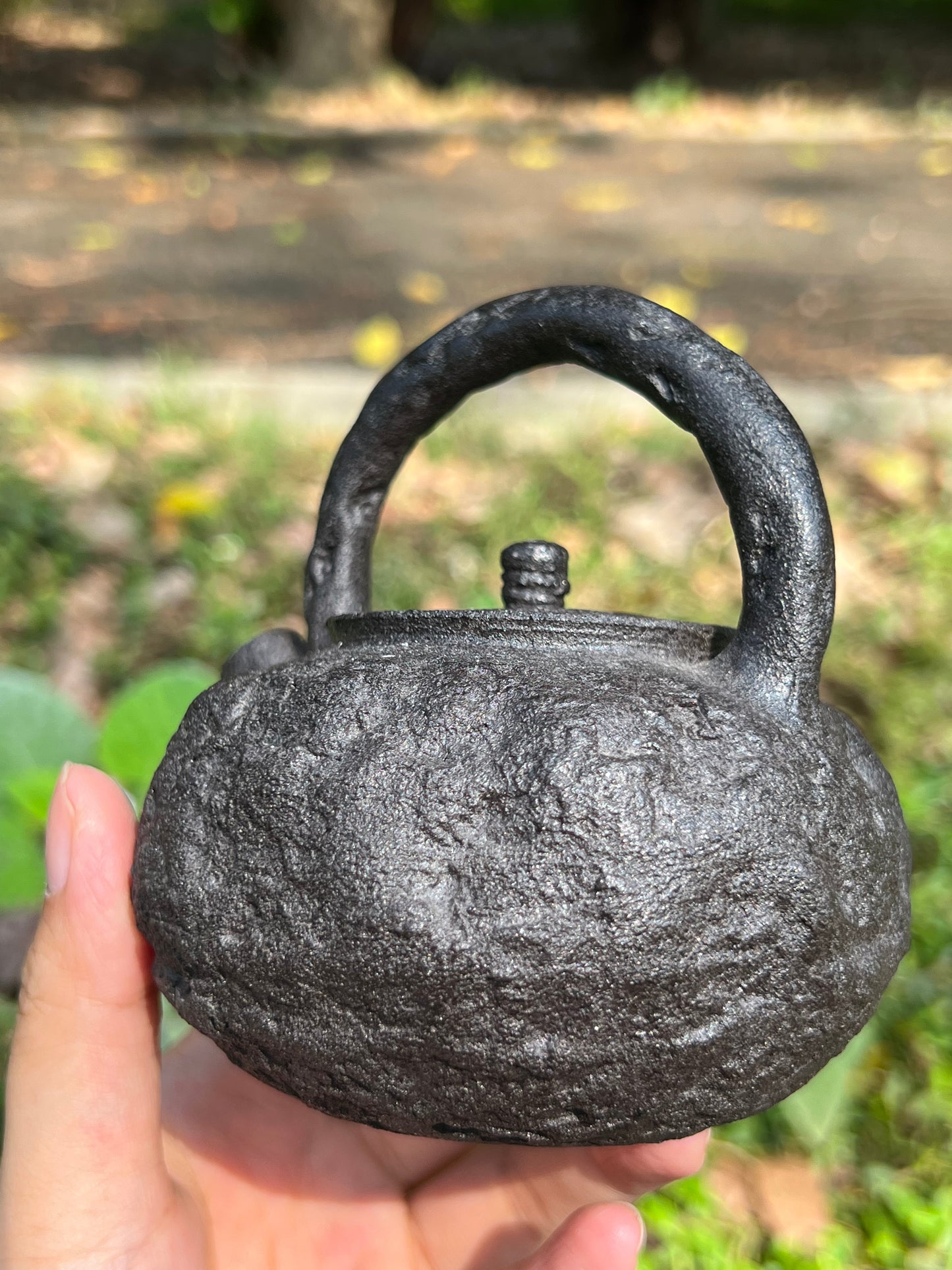 this is a purple clay teapot