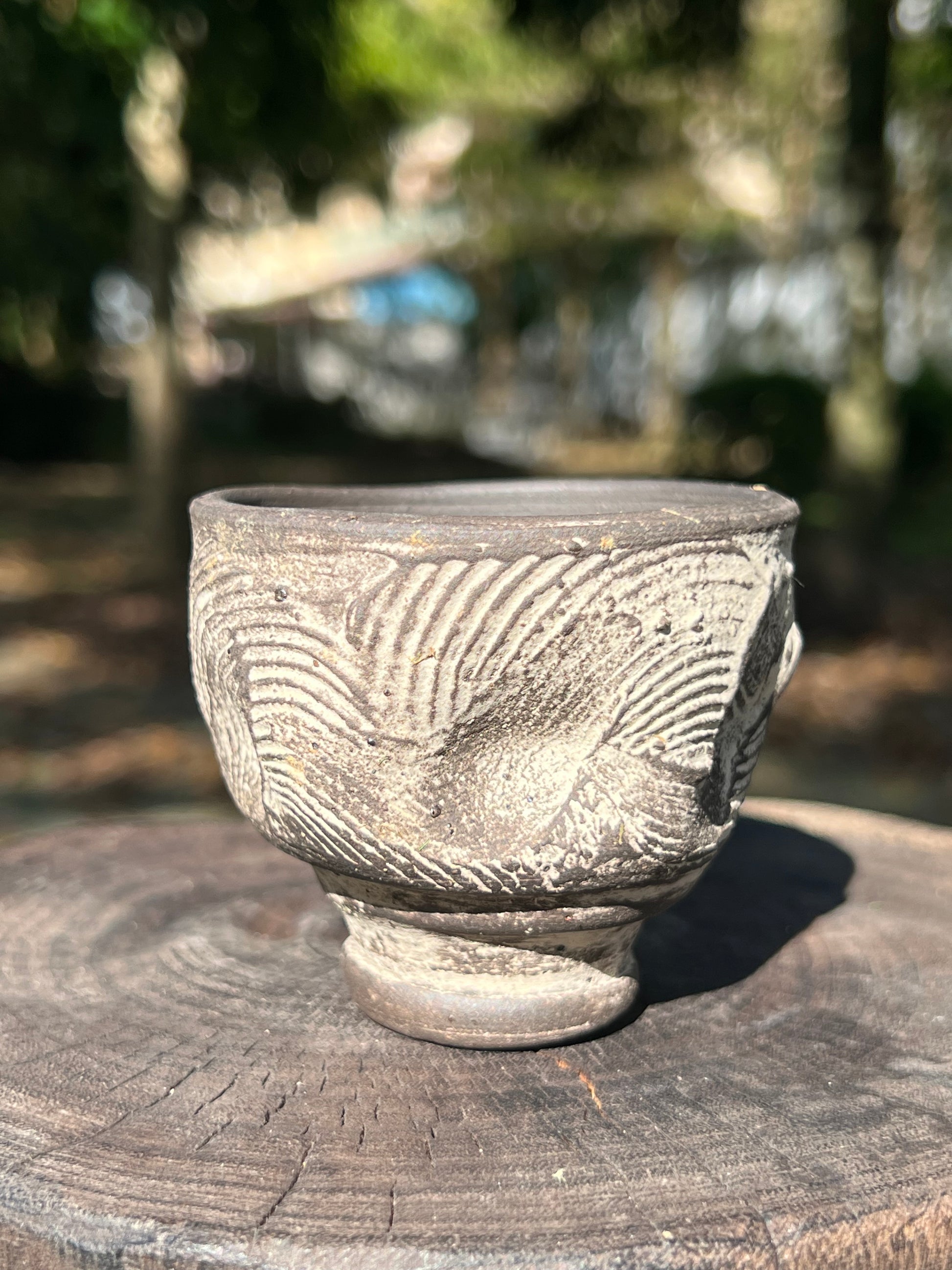 This is a pottery teacup