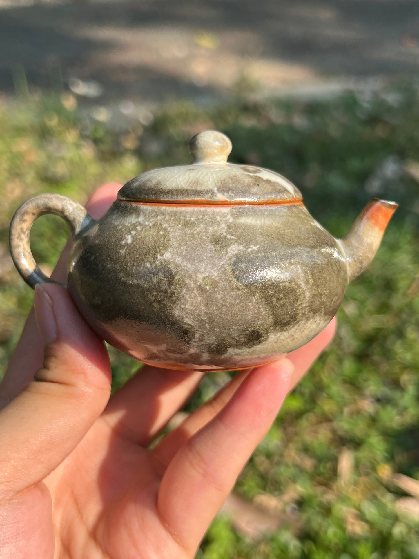 this is a ceramic teapot