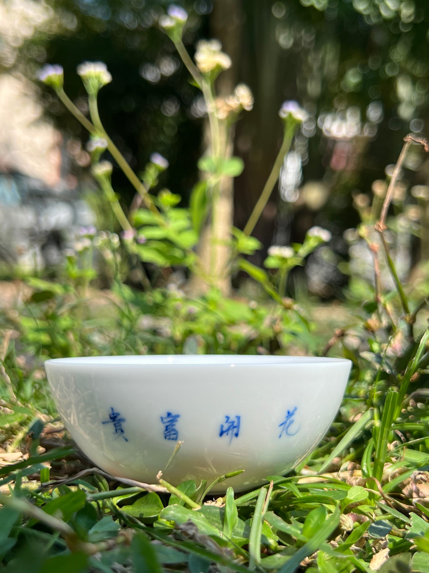 This is a Chinese Jingdezhen blue and white porcelain peony flower teacup