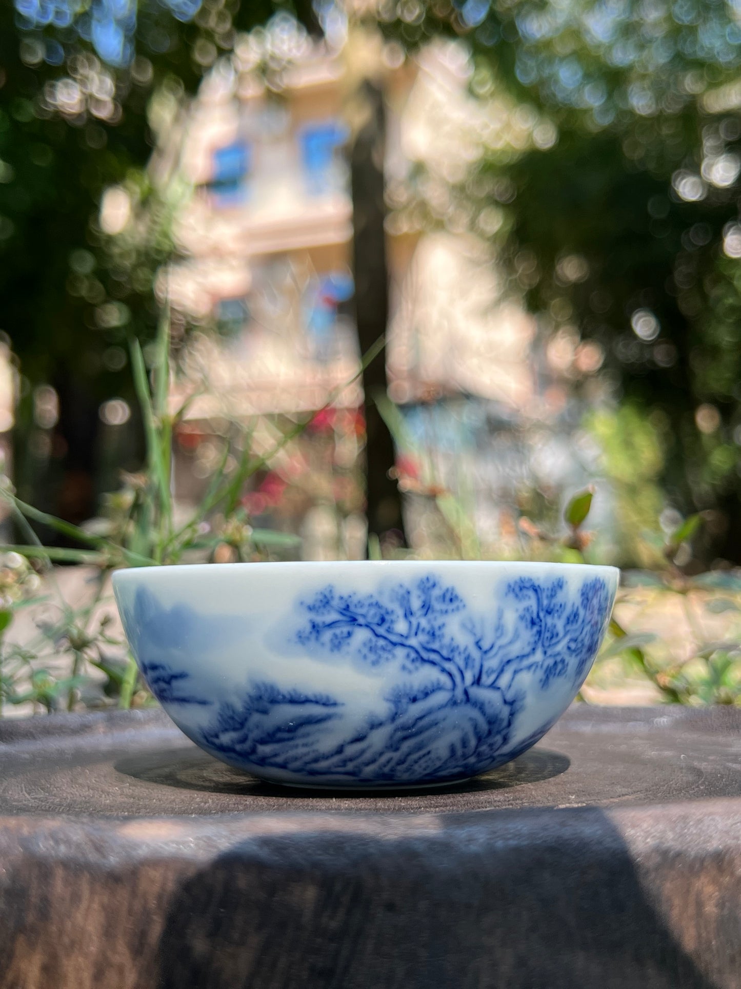 This is a Chinese Jingdezhen blue and white porcelain landscape teacup