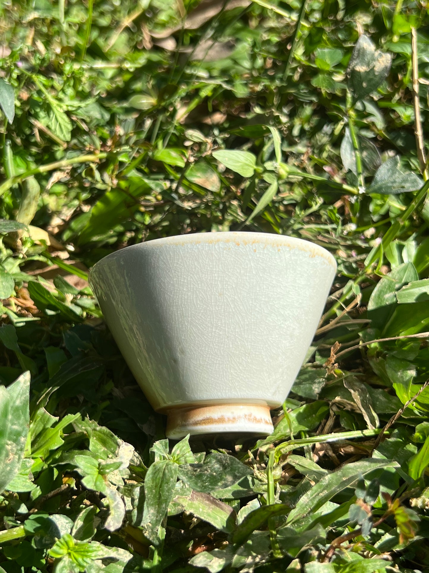 This is a woodfired pottery flower teacup