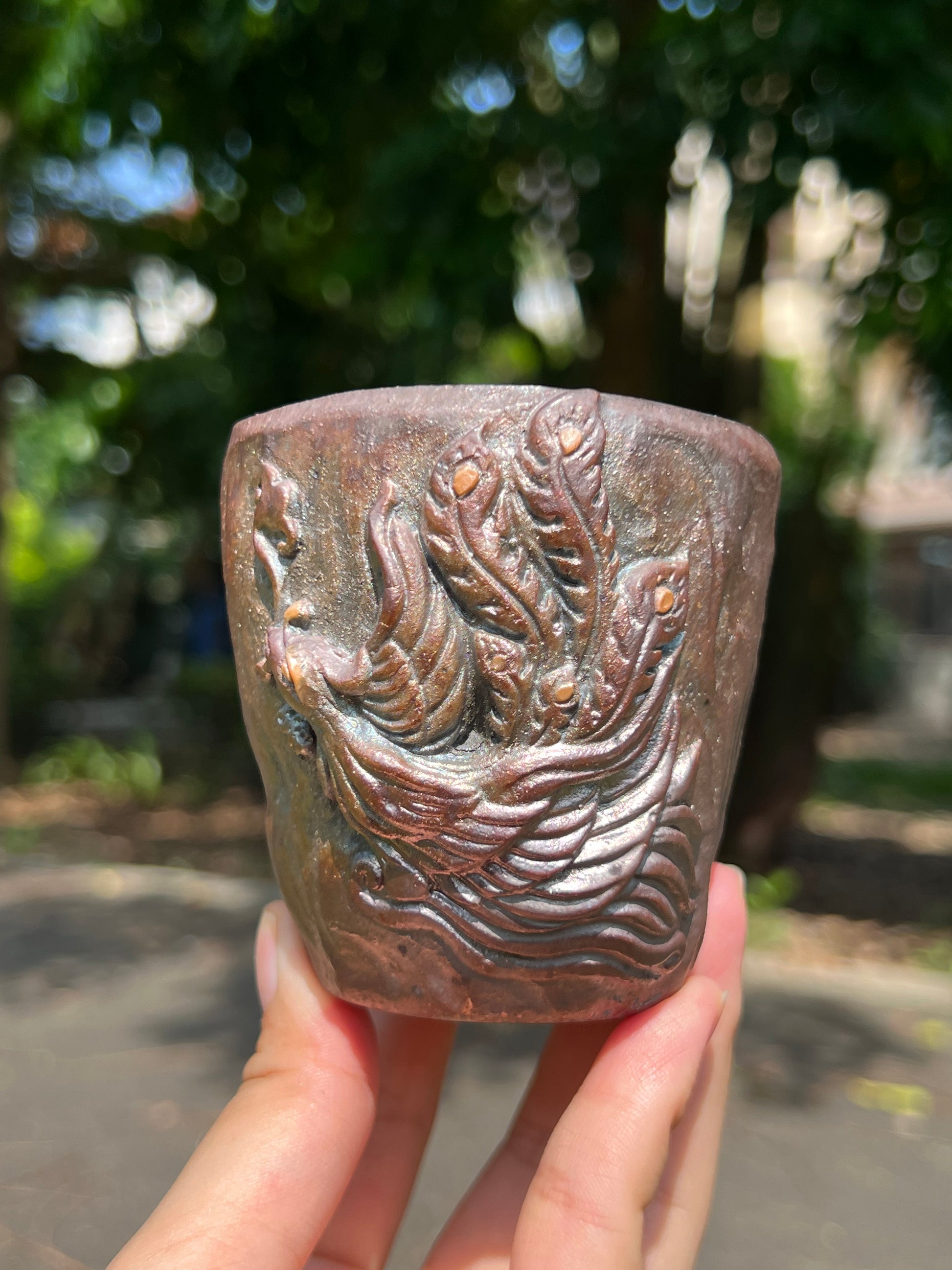 This is a woodfired tietai pottery phoenix  teacup