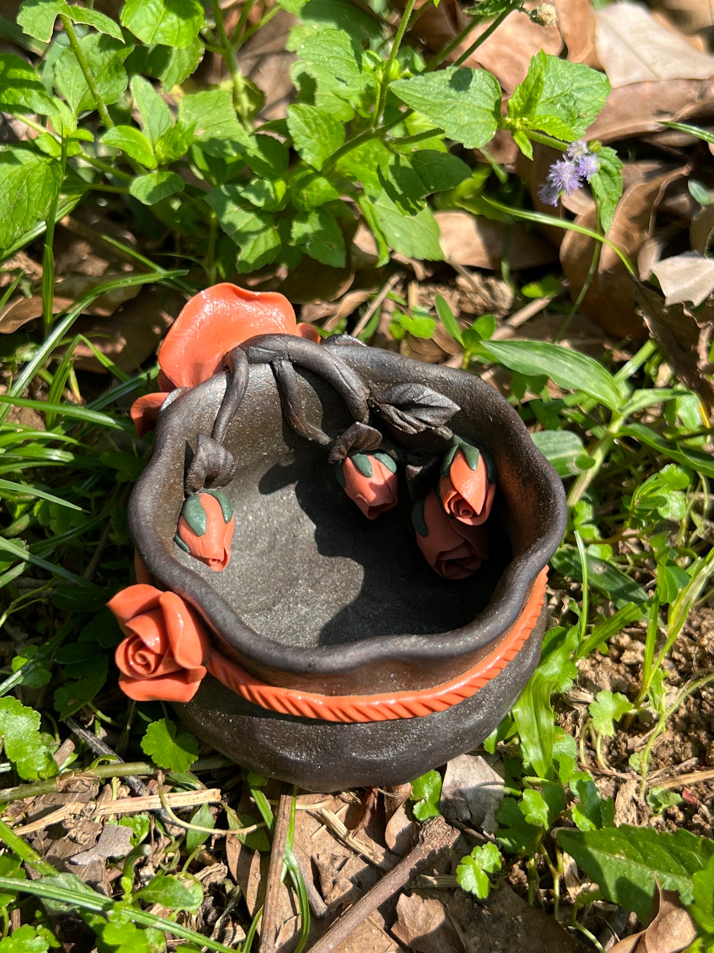 This is a woodfired tietai pottery flower teacup