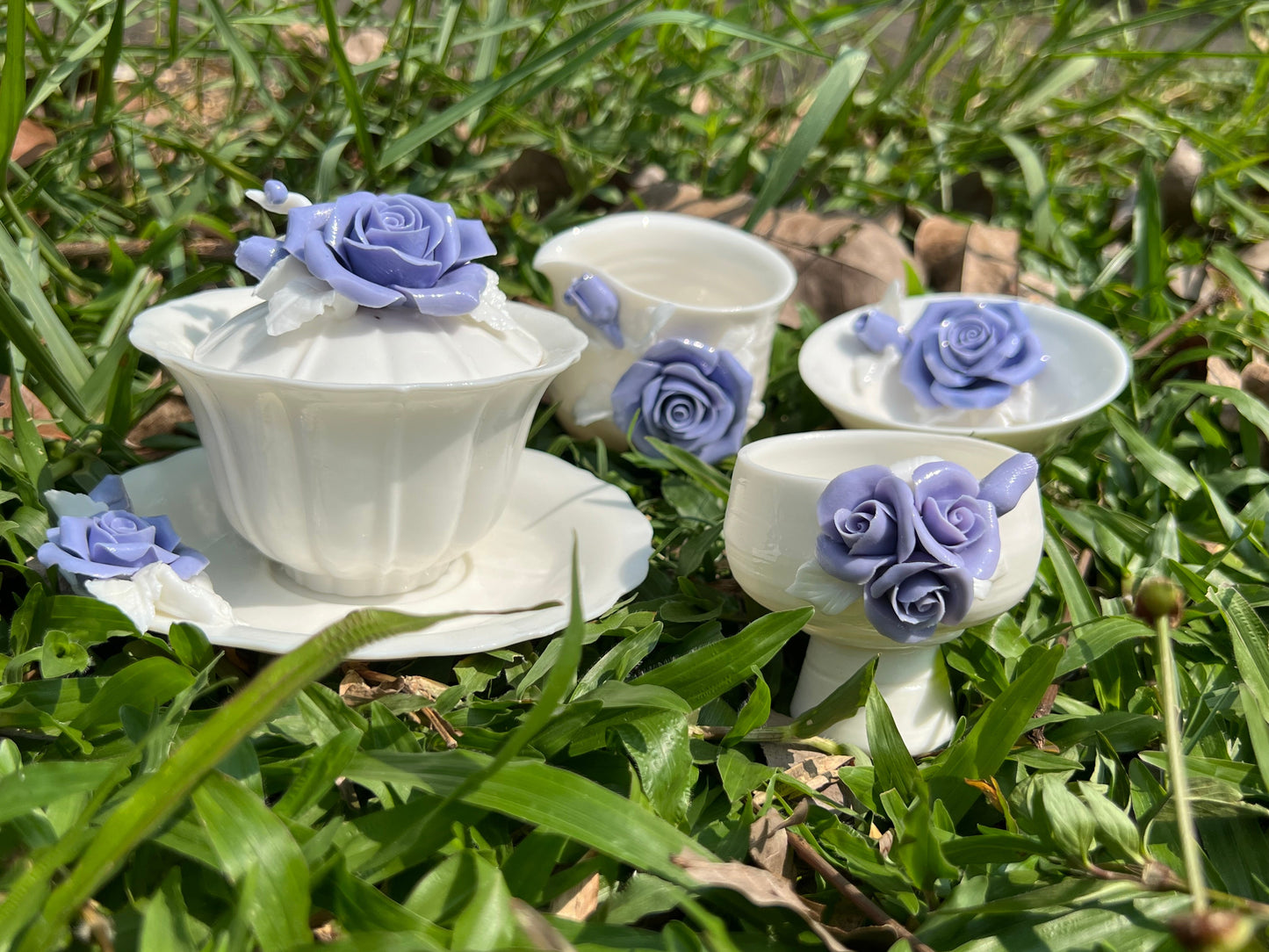 this is a woodfired white fine pottery flower teacup