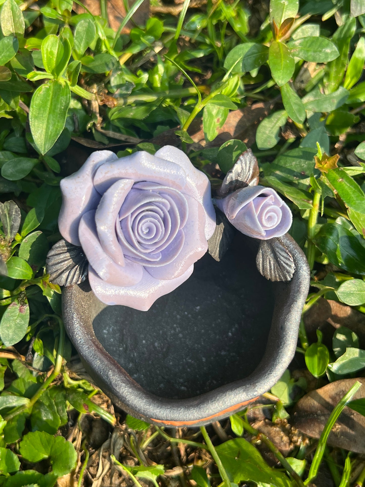 This is a woodfired tietai pottery flower teacup