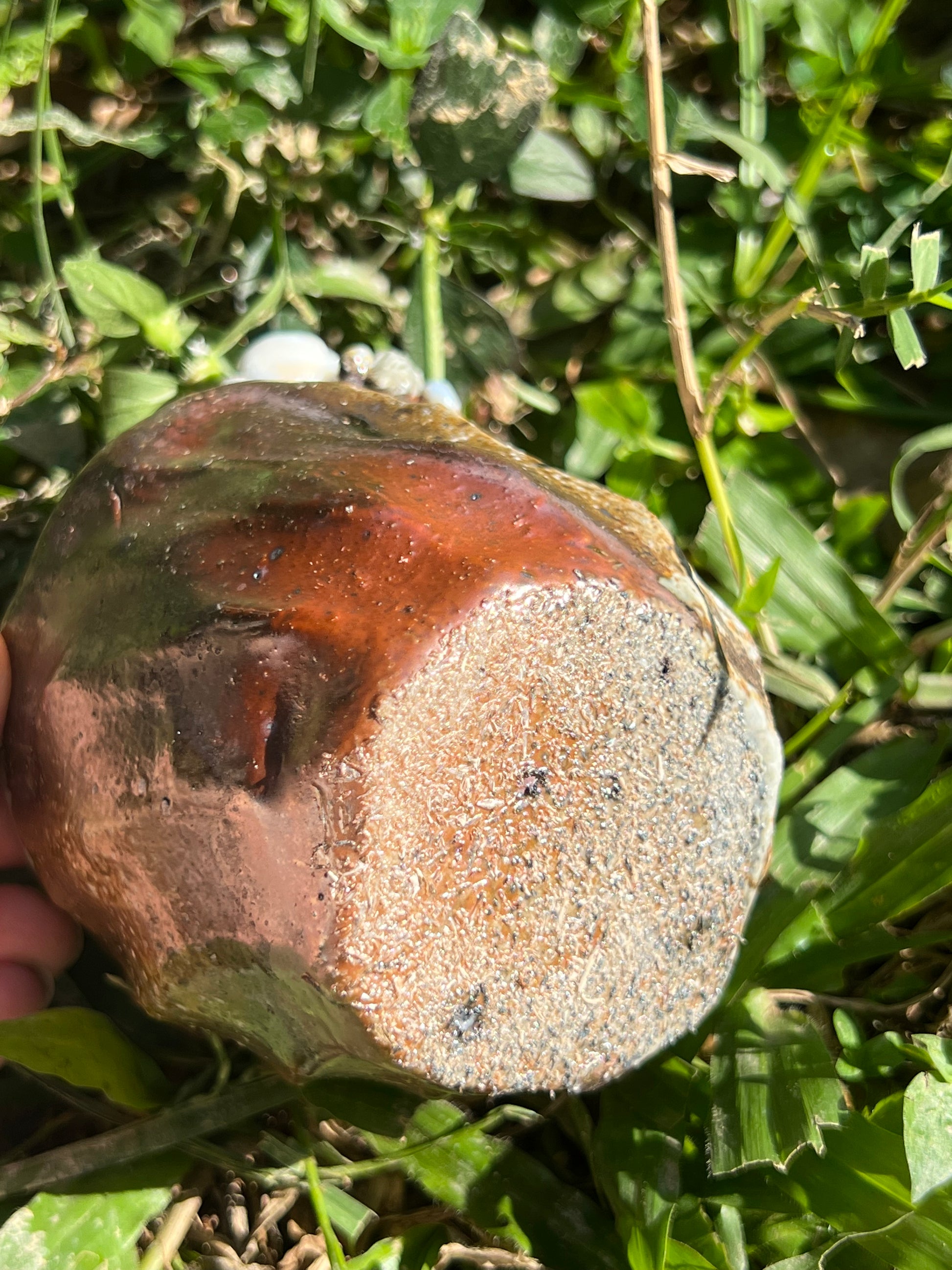 This is a woodfired pottery flower teacup