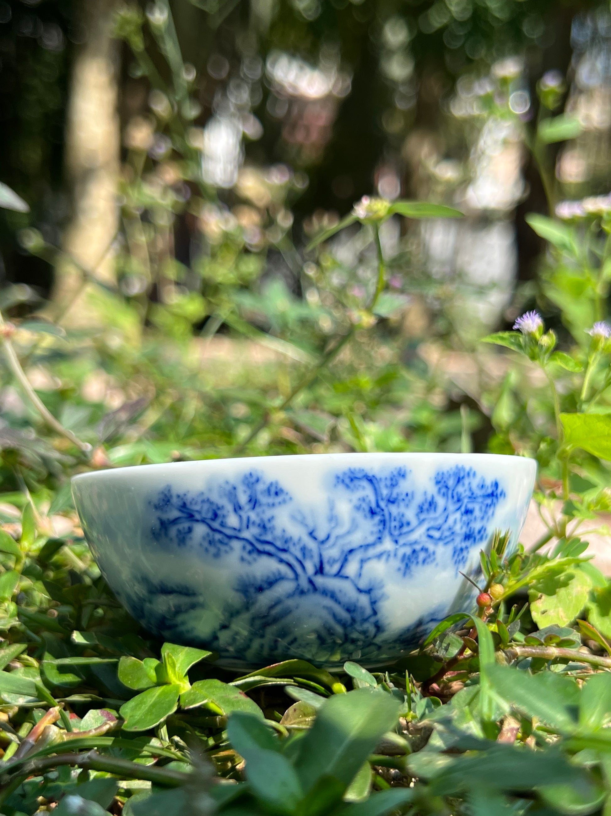 This is a Chinese Jingdezhen blue and white porcelain landscape teacup