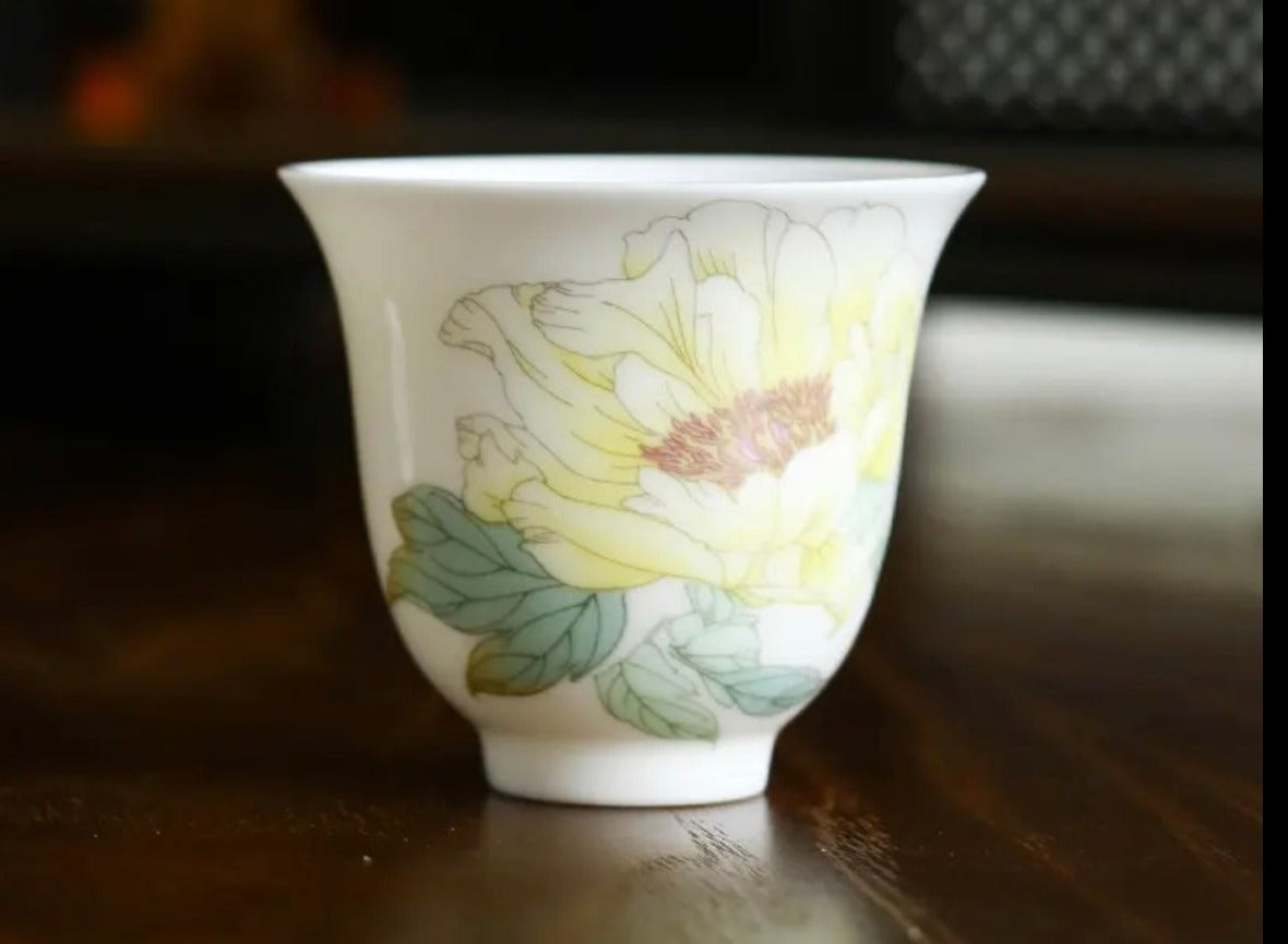 This is a Chinese Jingdezhen pastel flower teacup