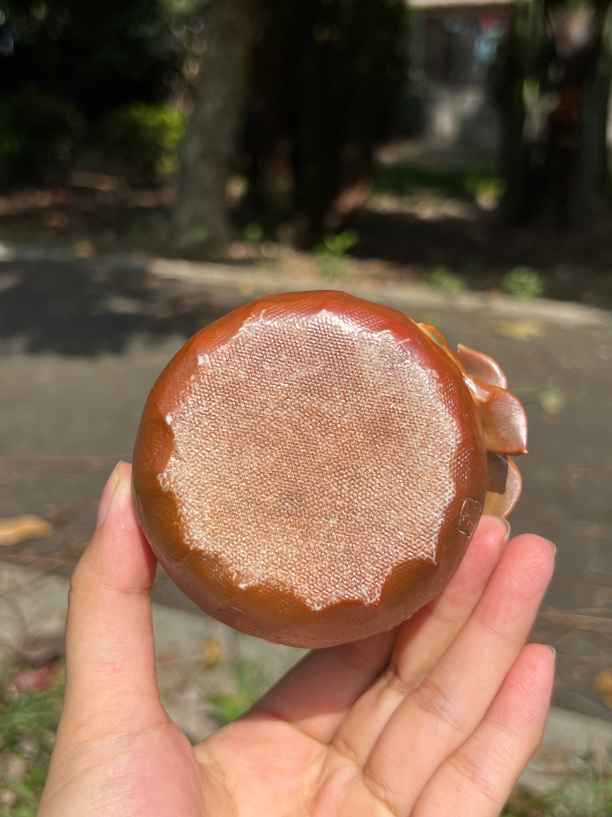 This is a woodfired pottery flower teacup