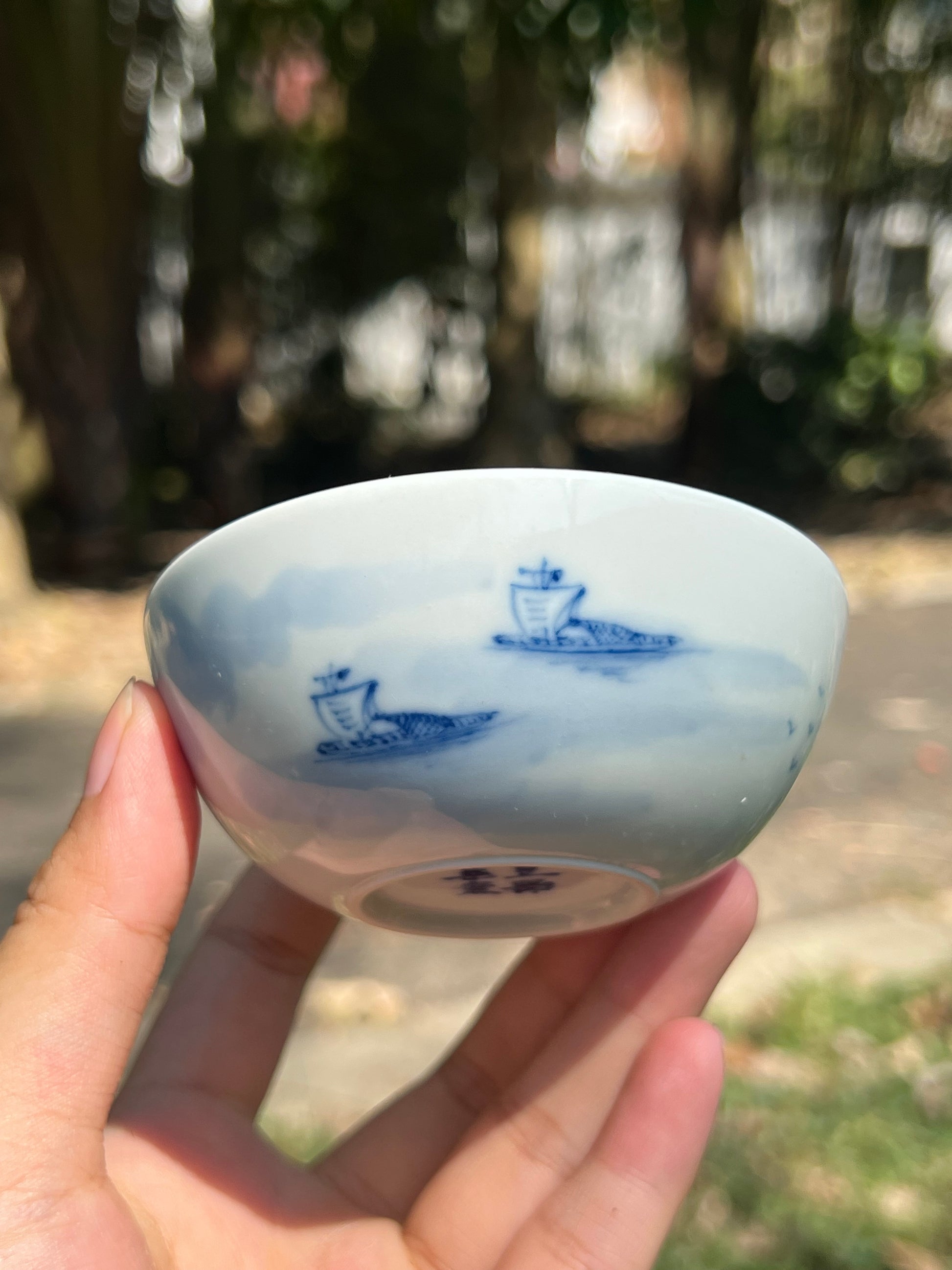 This is a Chinese Jingdezhen blue and white porcelain landscape teacup