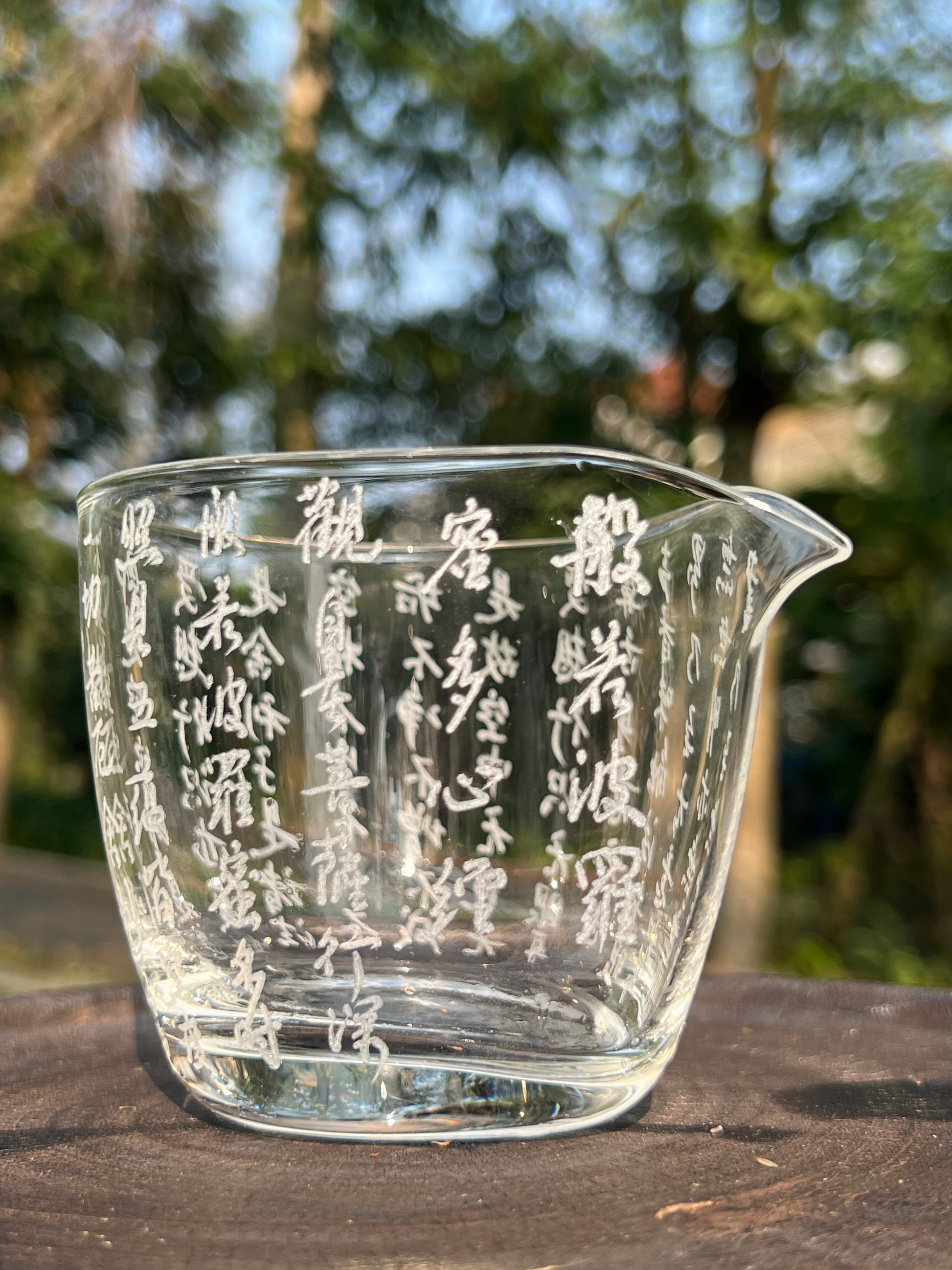 This is a hand engraved heart sutra glass faircup gongdaobei