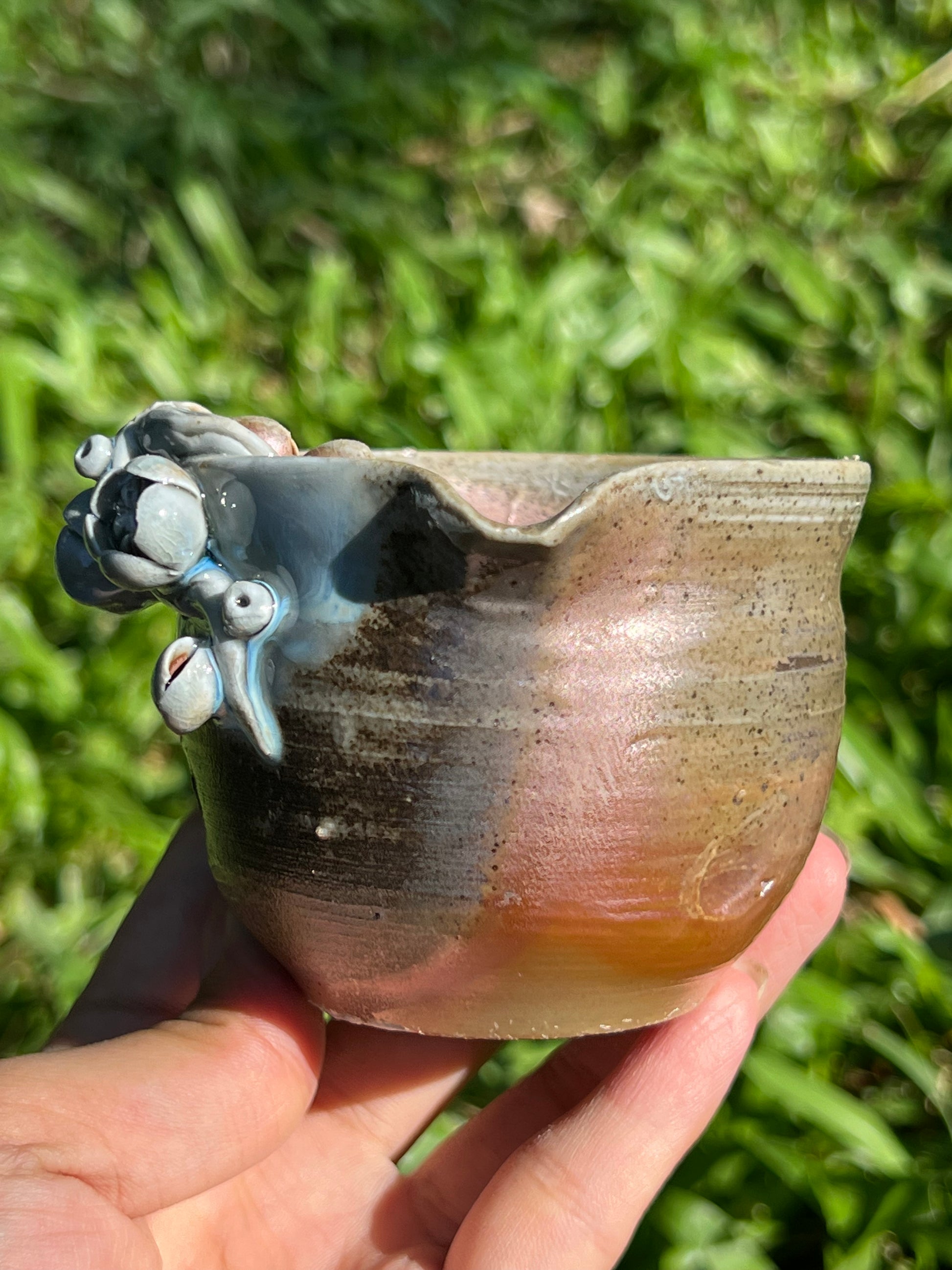 This is a woodfired pottery flower faircup gongdaobei