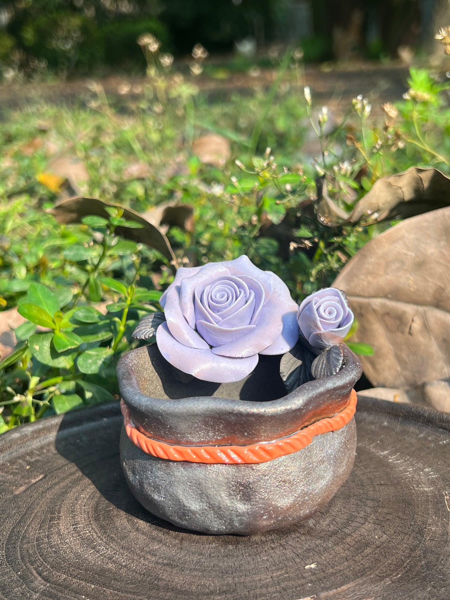 This is a woodfired tietai pottery flower teacup