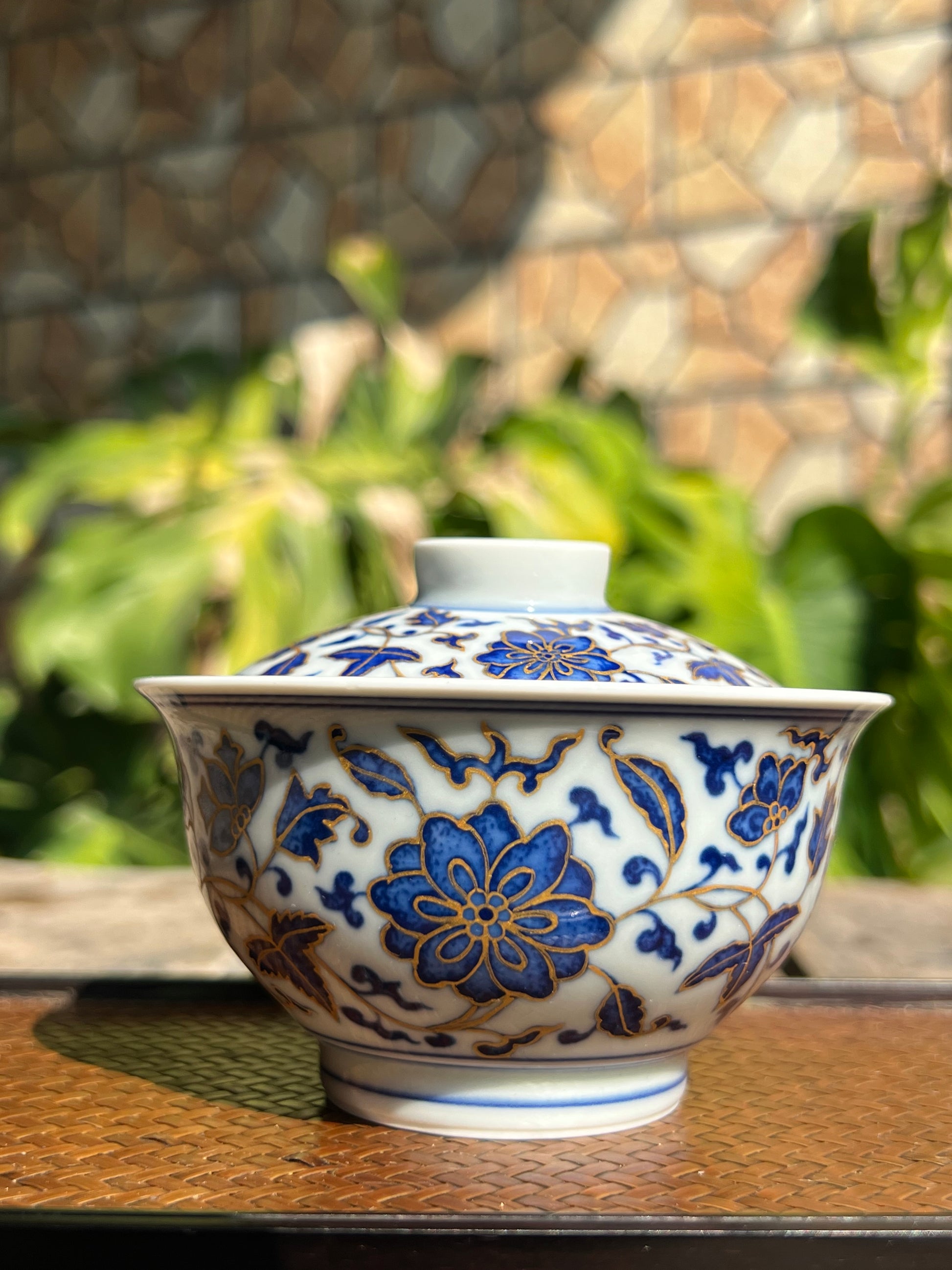 This is a Chinese Jingdezhen blue and white porcelain flower teapot gaiwan