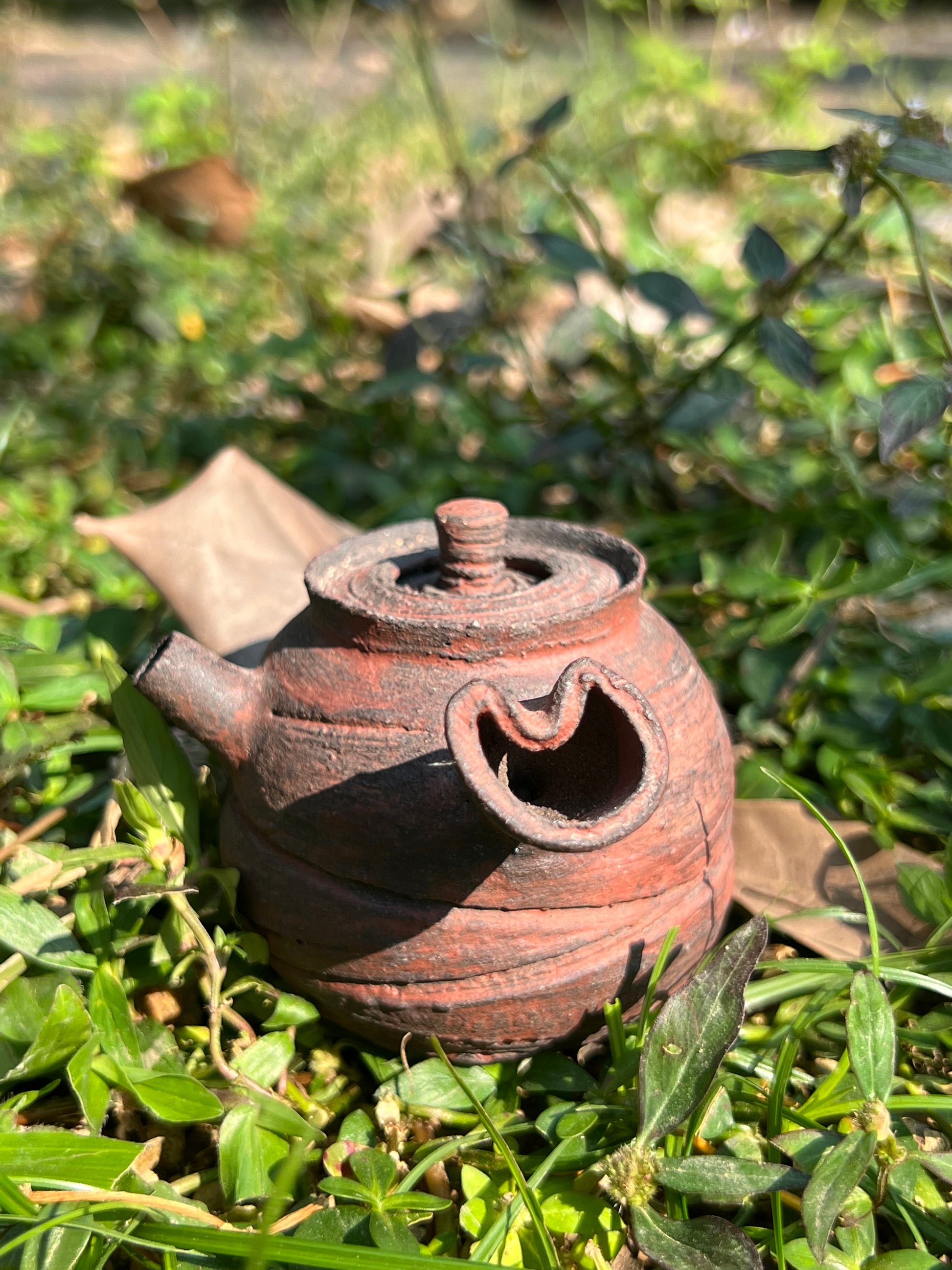 This is a pottery teapot