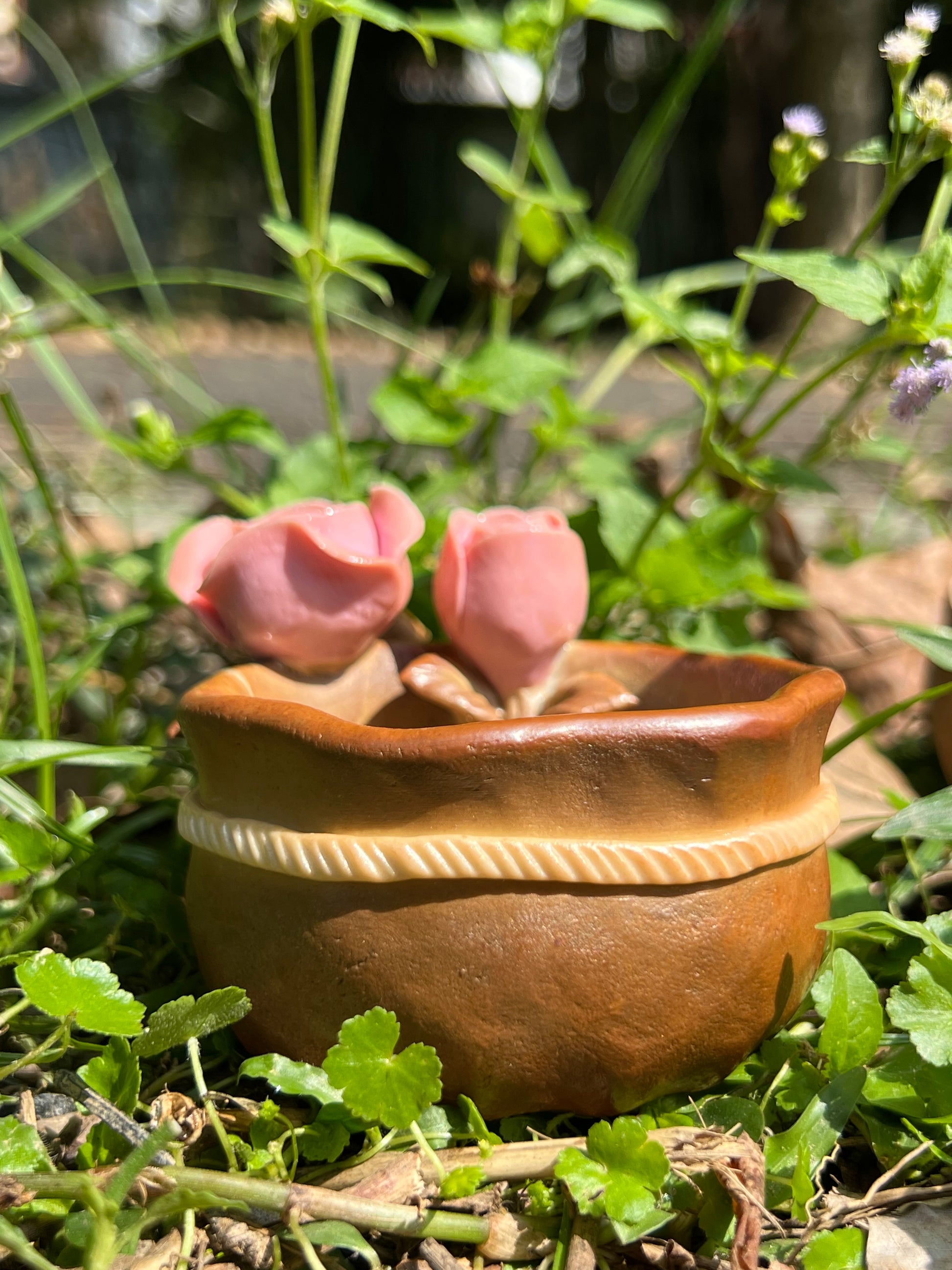 This is a woodfired pottery flower teacup