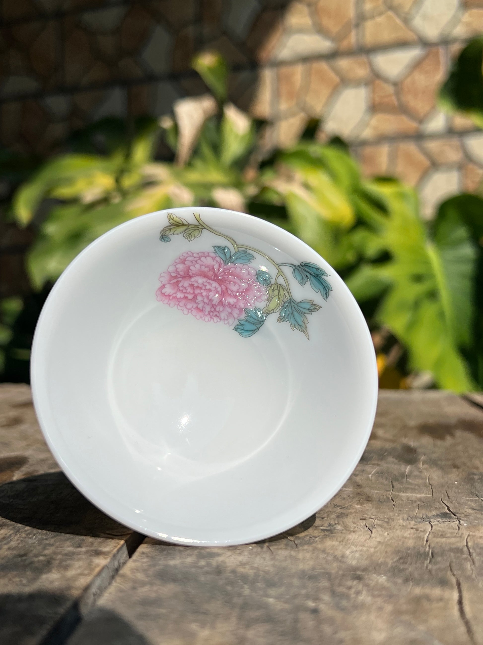 This is a Chinese Jingdezhen enamel flower teacup