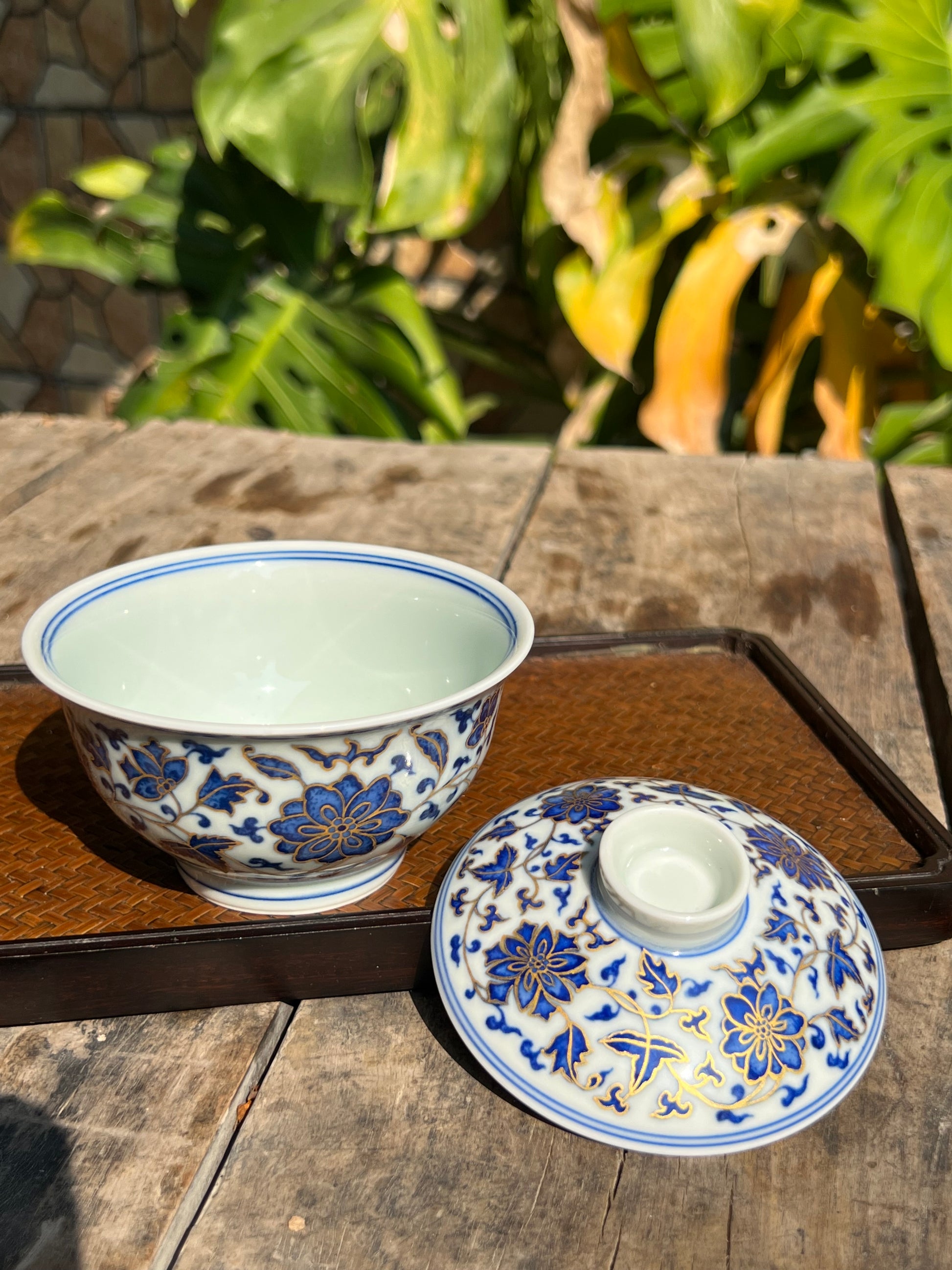 This is a Chinese Jingdezhen blue and white porcelain flower teapot gaiwan