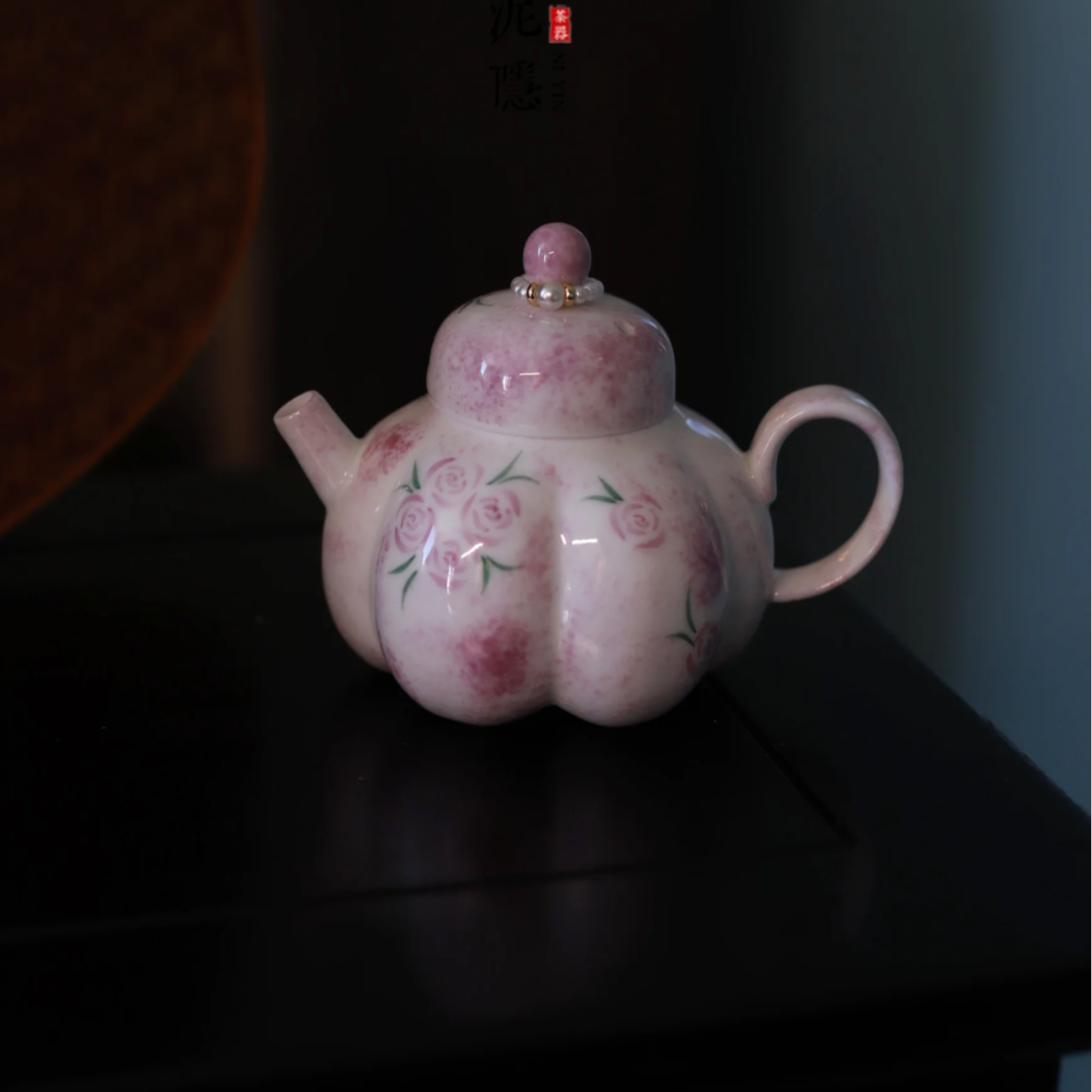 this is a ceramic teapot