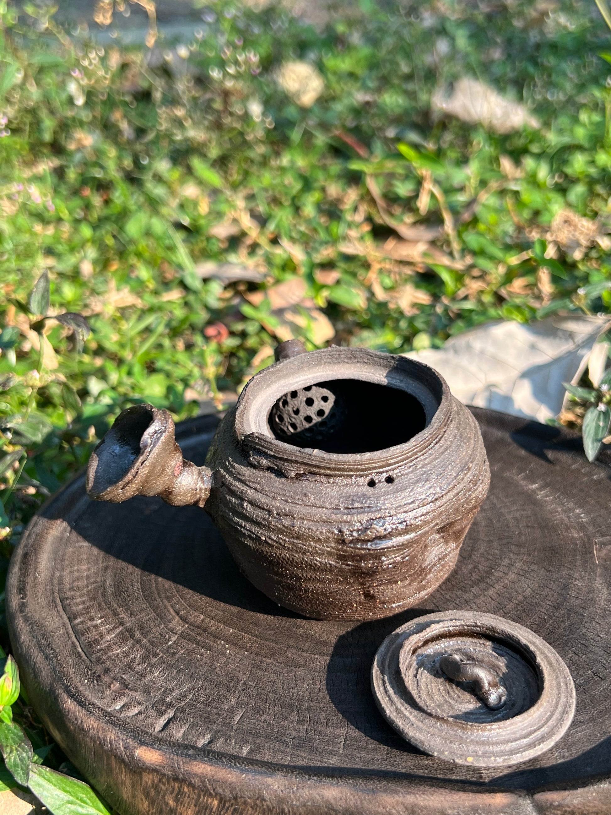 This is a purple clay teapot