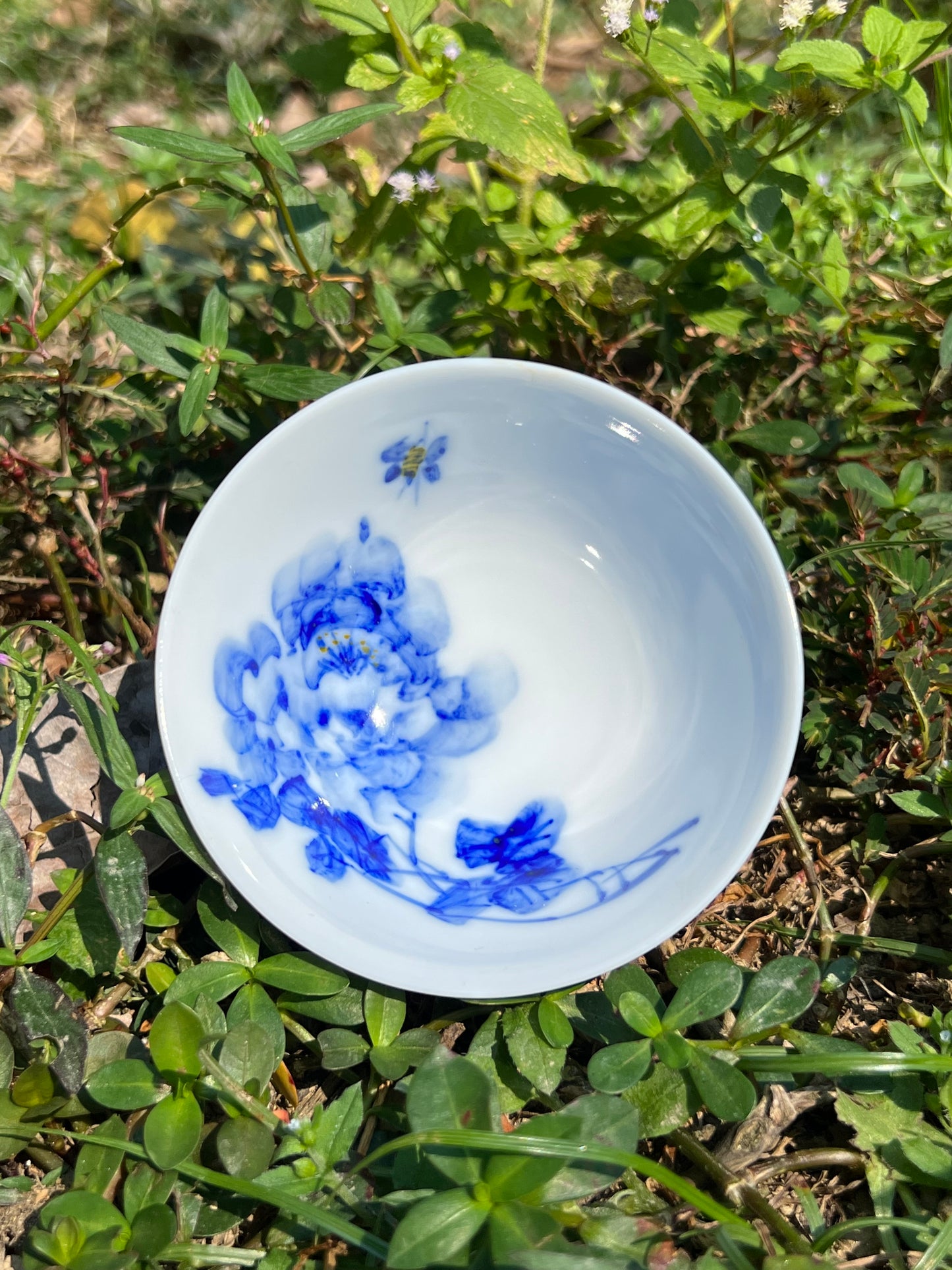 This is a Chinese Jingdezhen blue and white porcelain landscape teacup