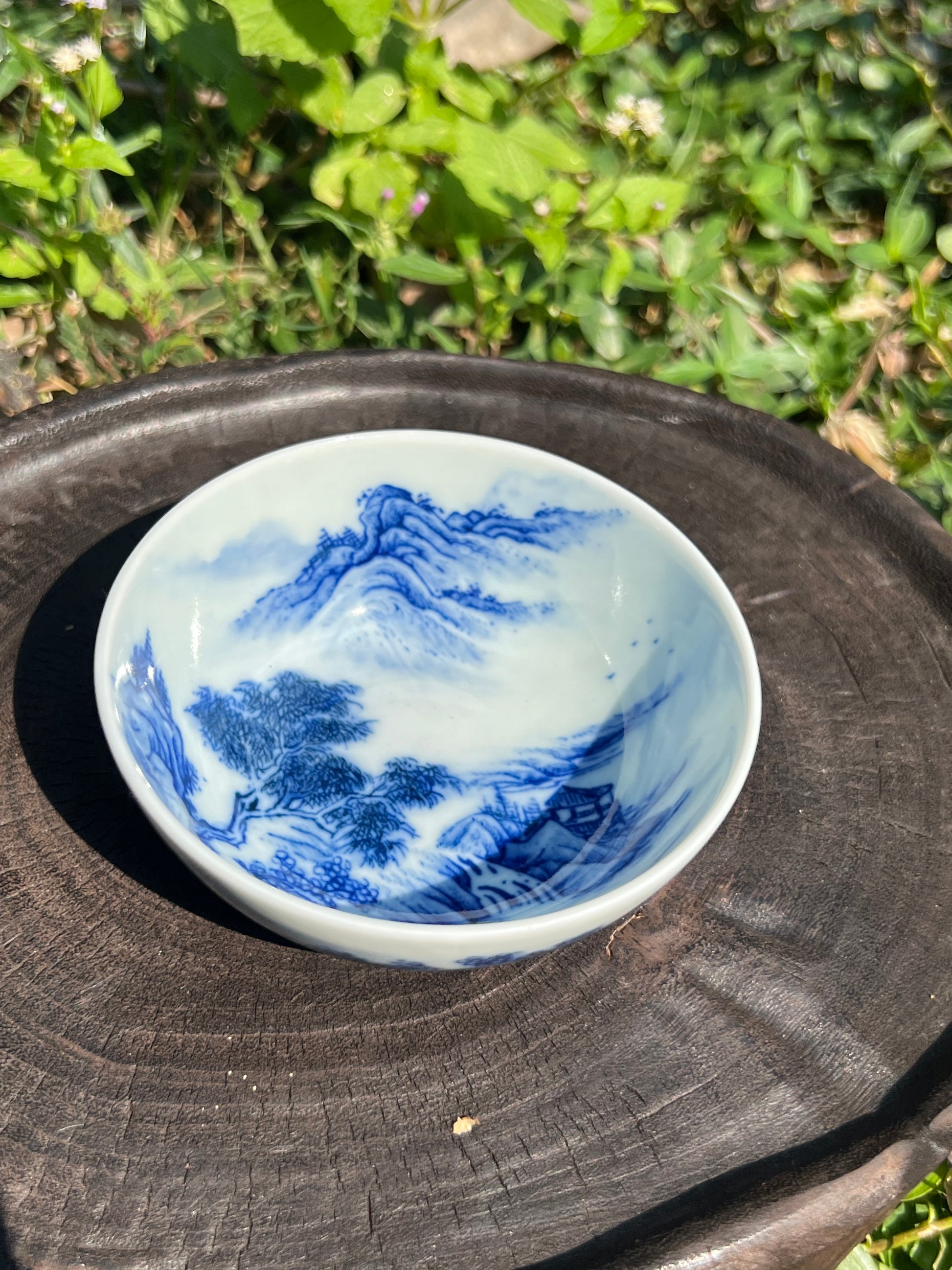 This is a Chinese Jingdezhen blue and white porcelain landscape teacup