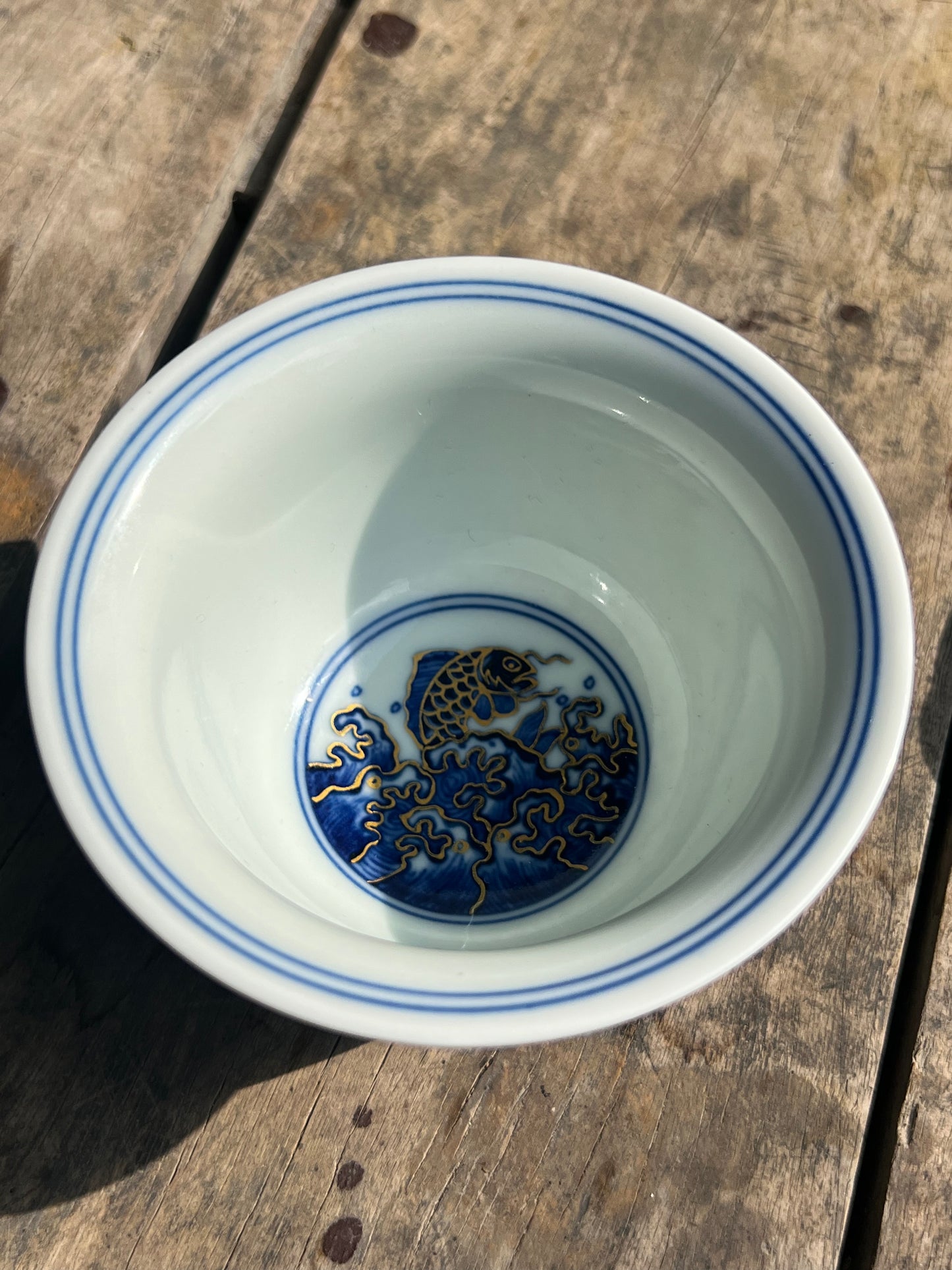 This is a Chinese Jingdezhen blue and white porcelain dragon teapot gaiwan