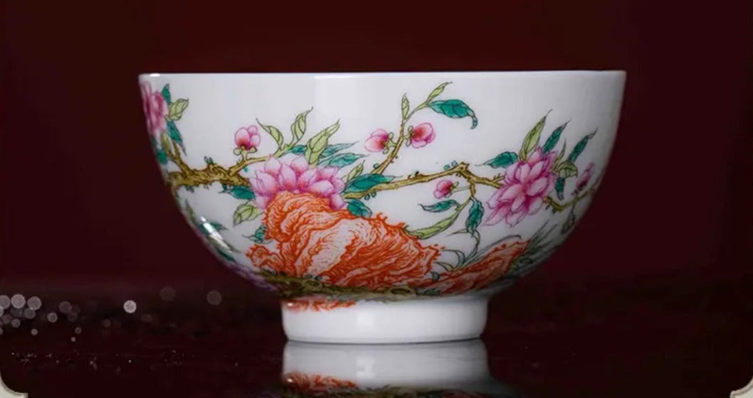 This is a Chinese Jingdezhen enamel flower teacup