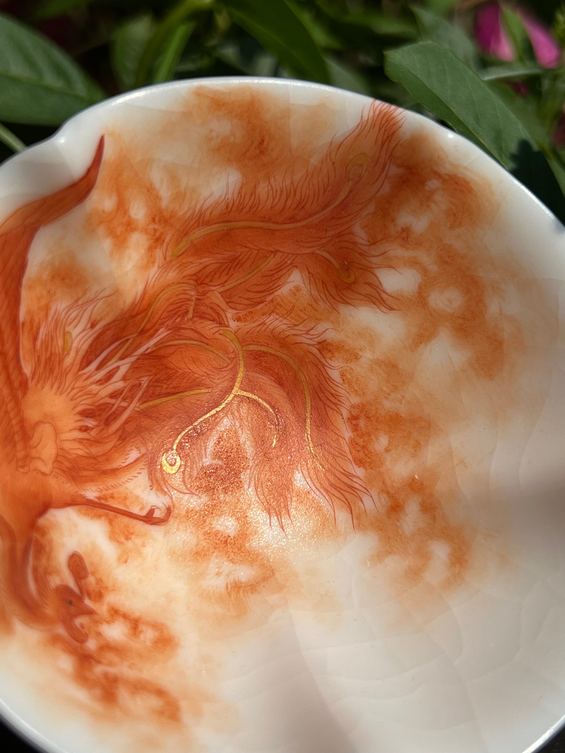 this is a Chinese Jingdezhen alum red phoenix teacup.this is a ceramic teacup