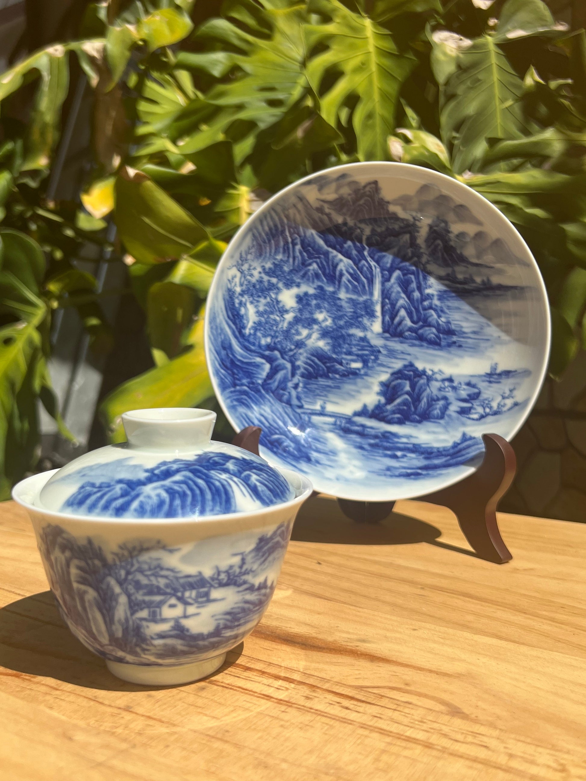 This is a Chinese Jingdezhen blue and white porcelain landscape teapot gaiwan