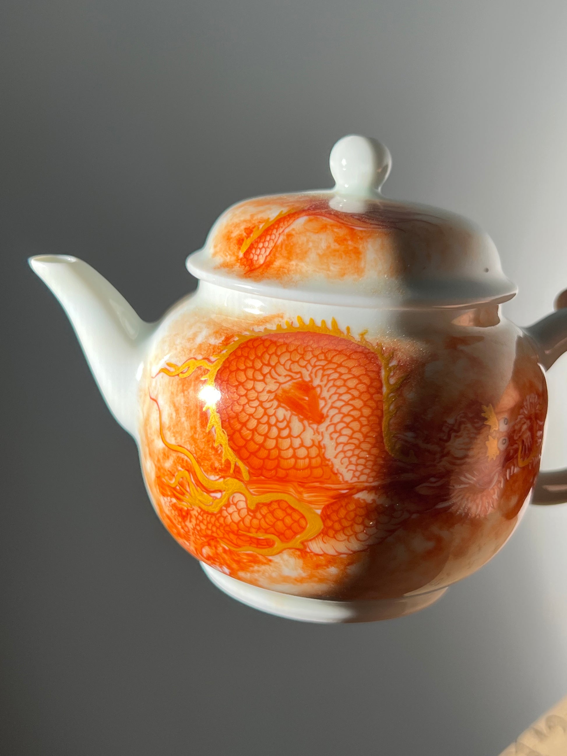 this is a Chinese Jingdezhen alum red dragon phoenix teapot.this is a ceramic teapot