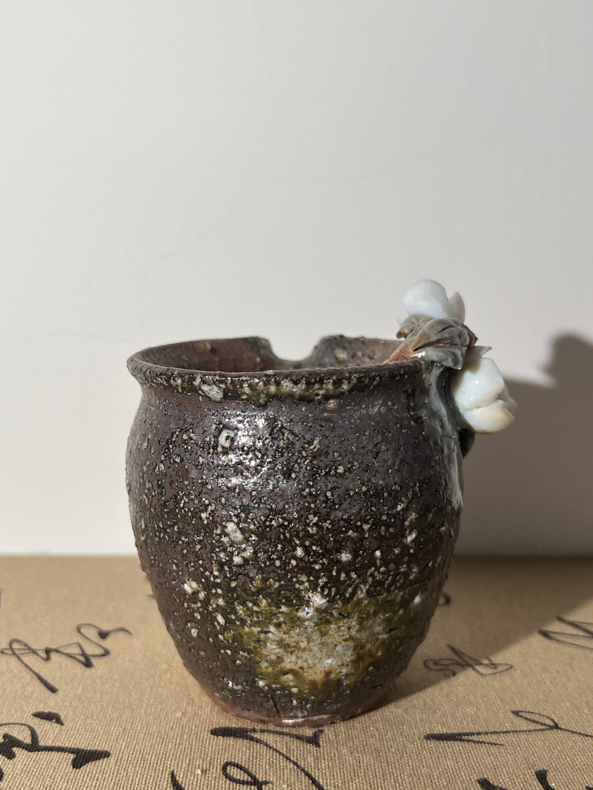 This is a woodfired pottery flower faircup gongdaobei