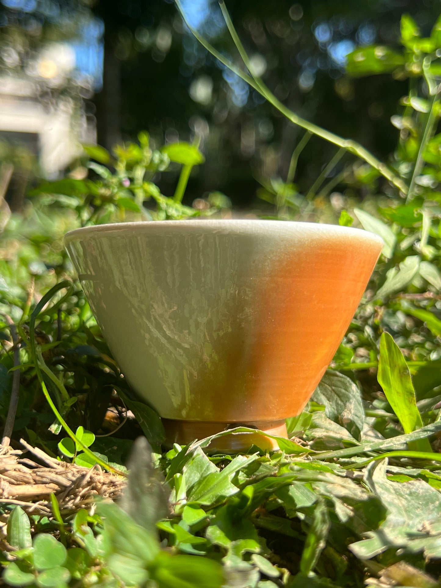 This is a woodfired pottery flower teacup