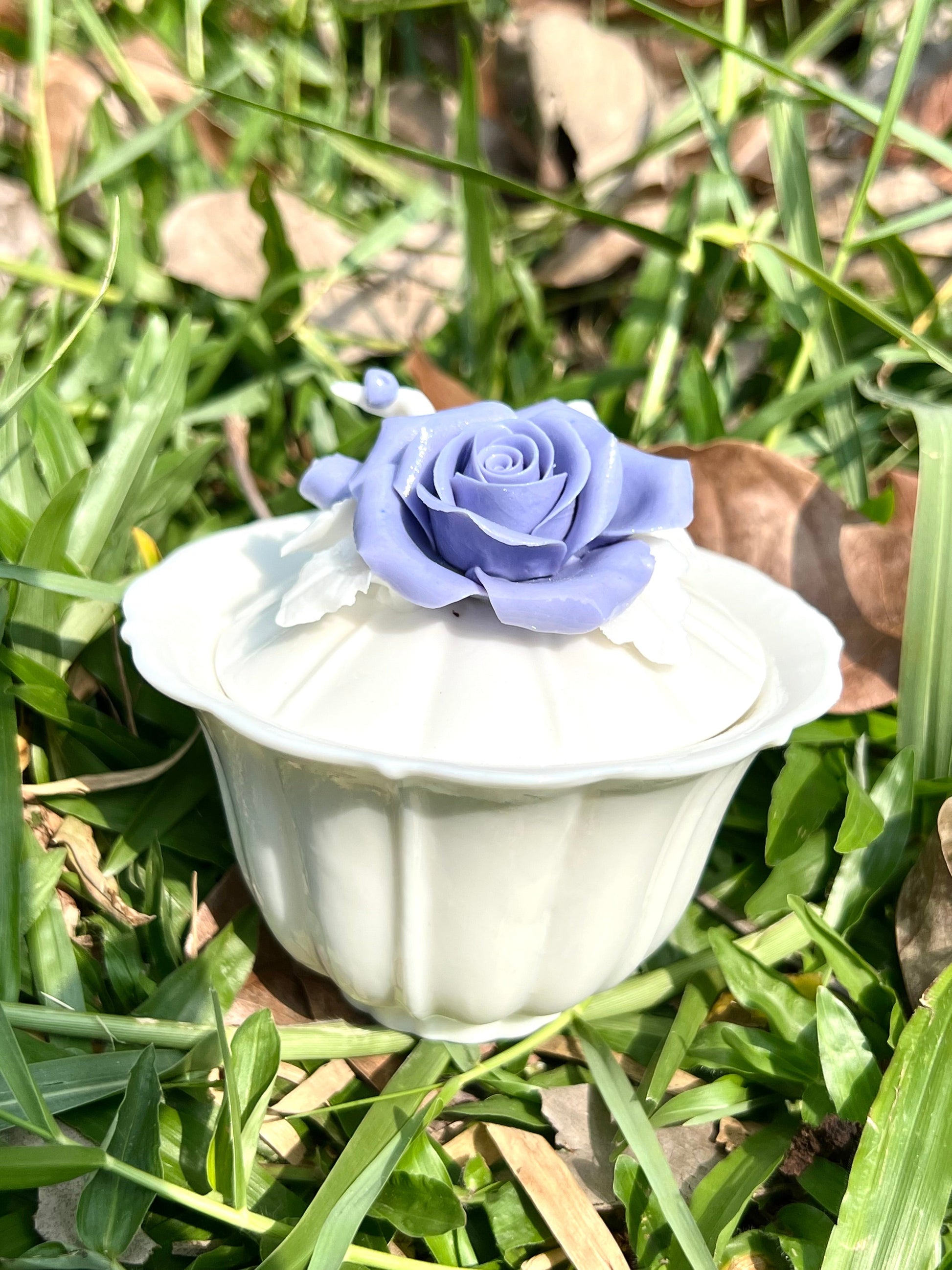 this is a woodfired white fine pottery flower teacup