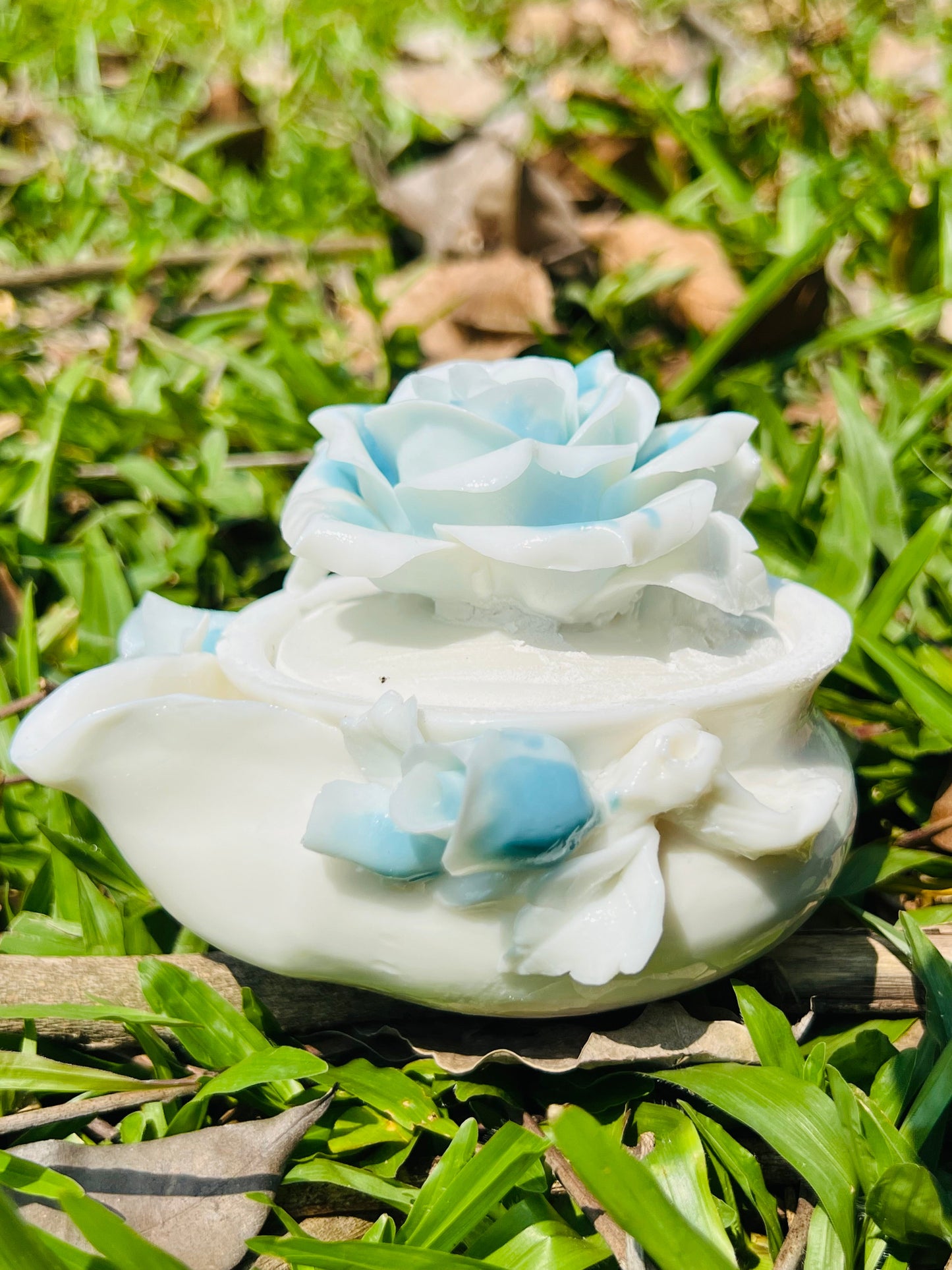 this is a woodfired white fine pottery flower teacup