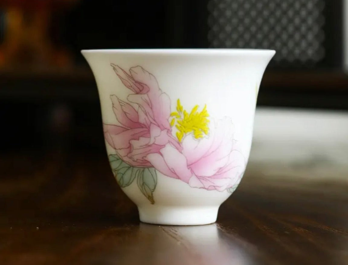 This is a Chinese Jingdezhen pastel flower teacup