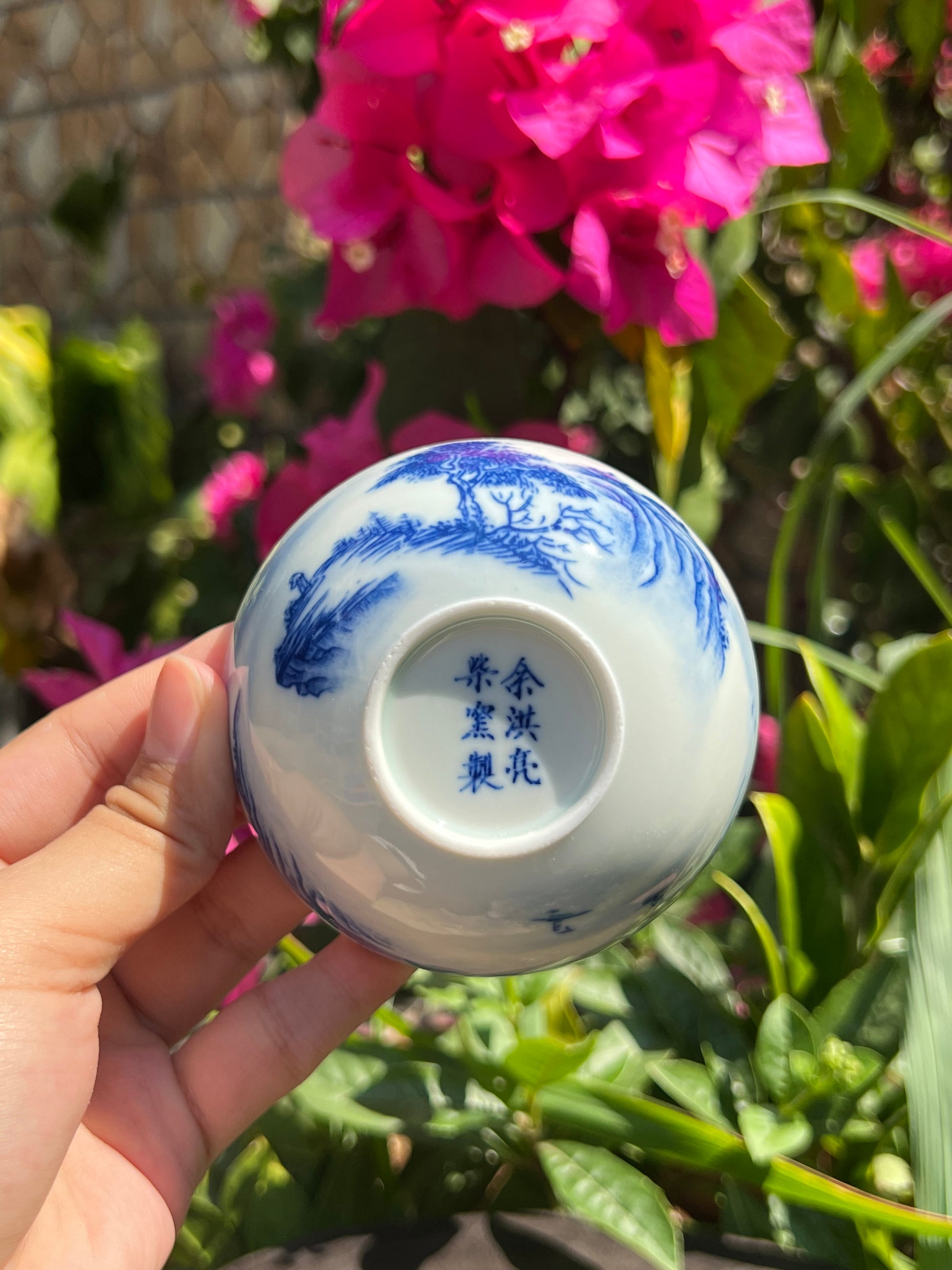 This is a Chinese Jingdezhen blue and white porcelain landscape teacup