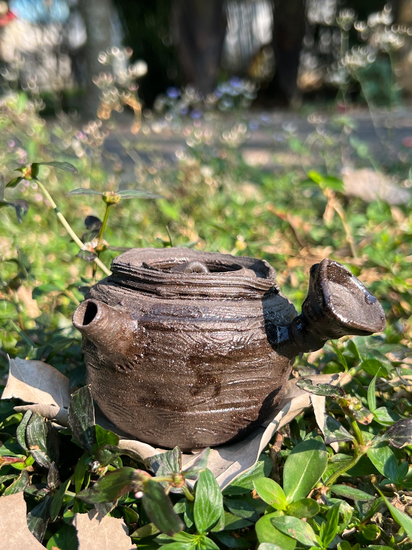 This is a purple clay teapot