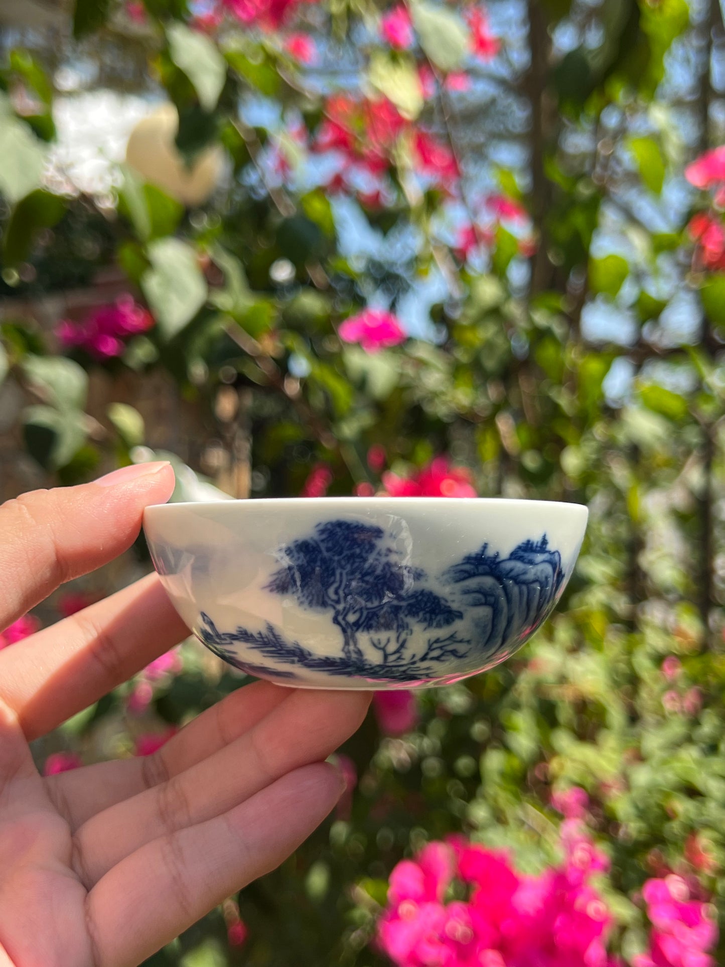 This is a Chinese Jingdezhen blue and white porcelain landscape teacup