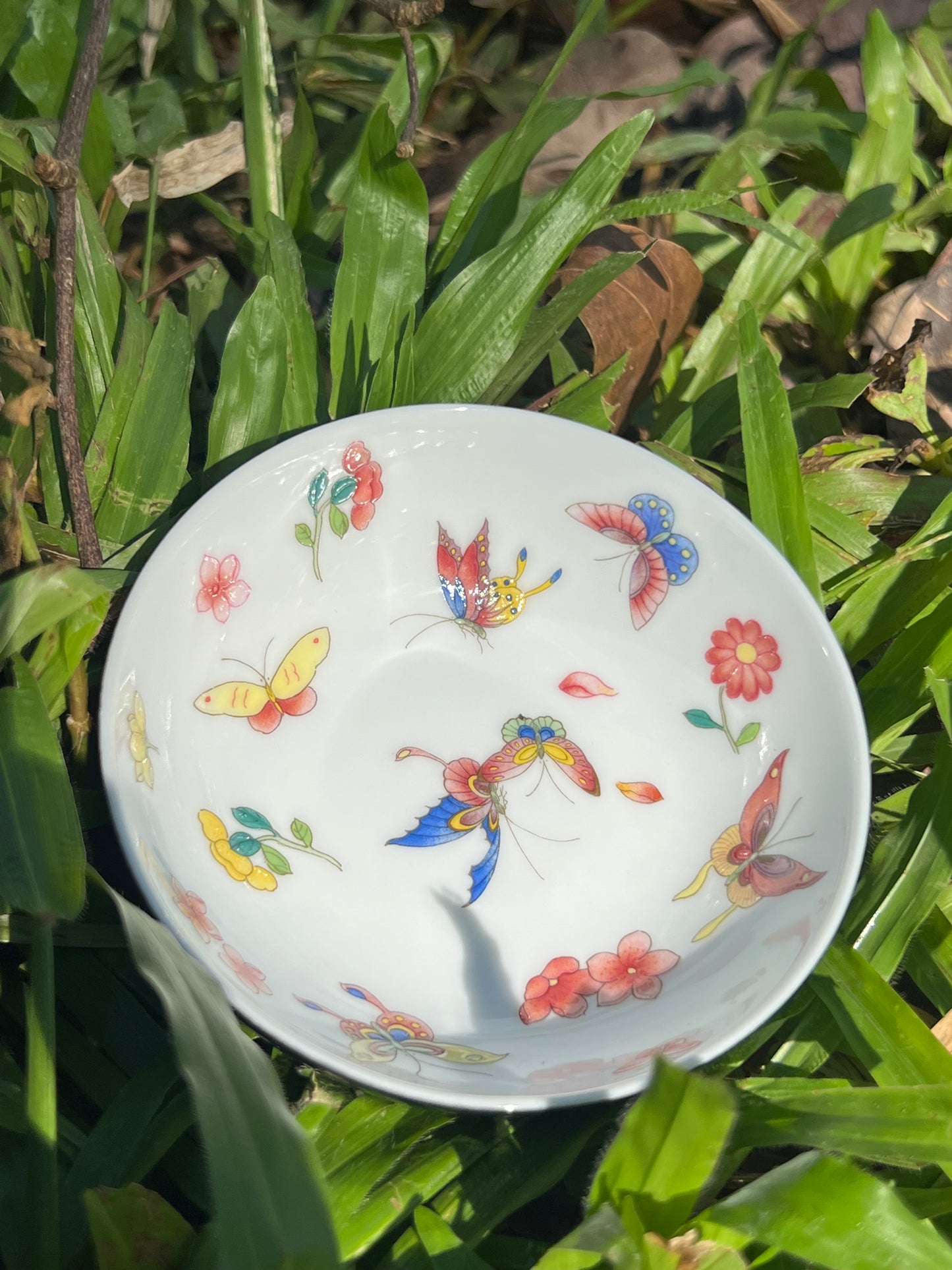 this is Chinese Jingdezhen enamel butterfly teacup. this is a ceramic teacup