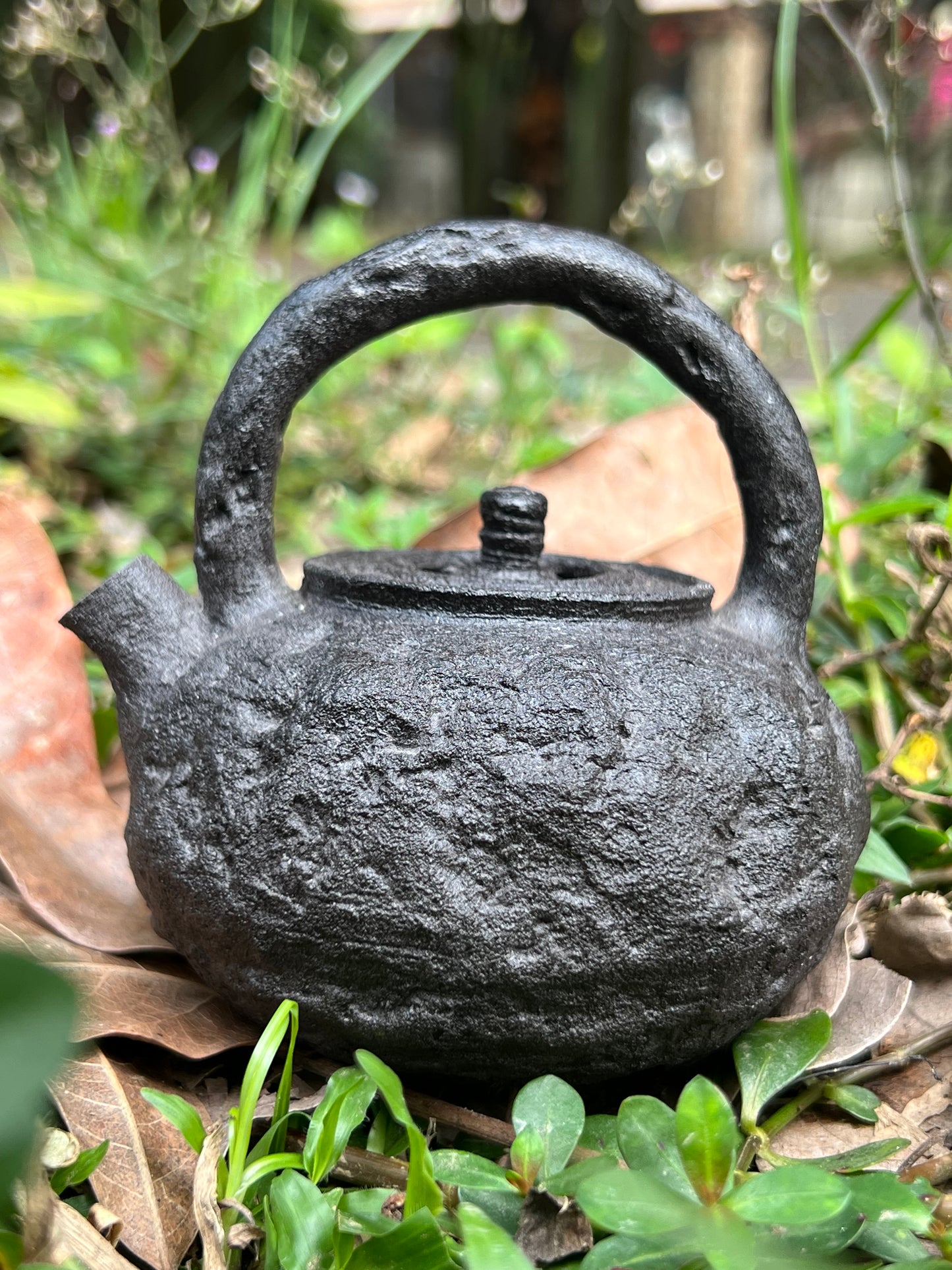 this is a purple clay teapot