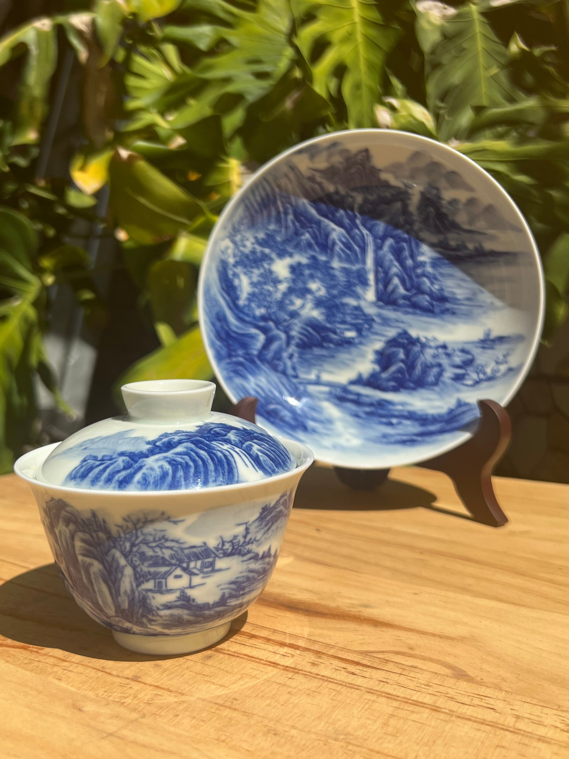 This is a Chinese Jingdezhen blue and white porcelain landscape teapot gaiwan