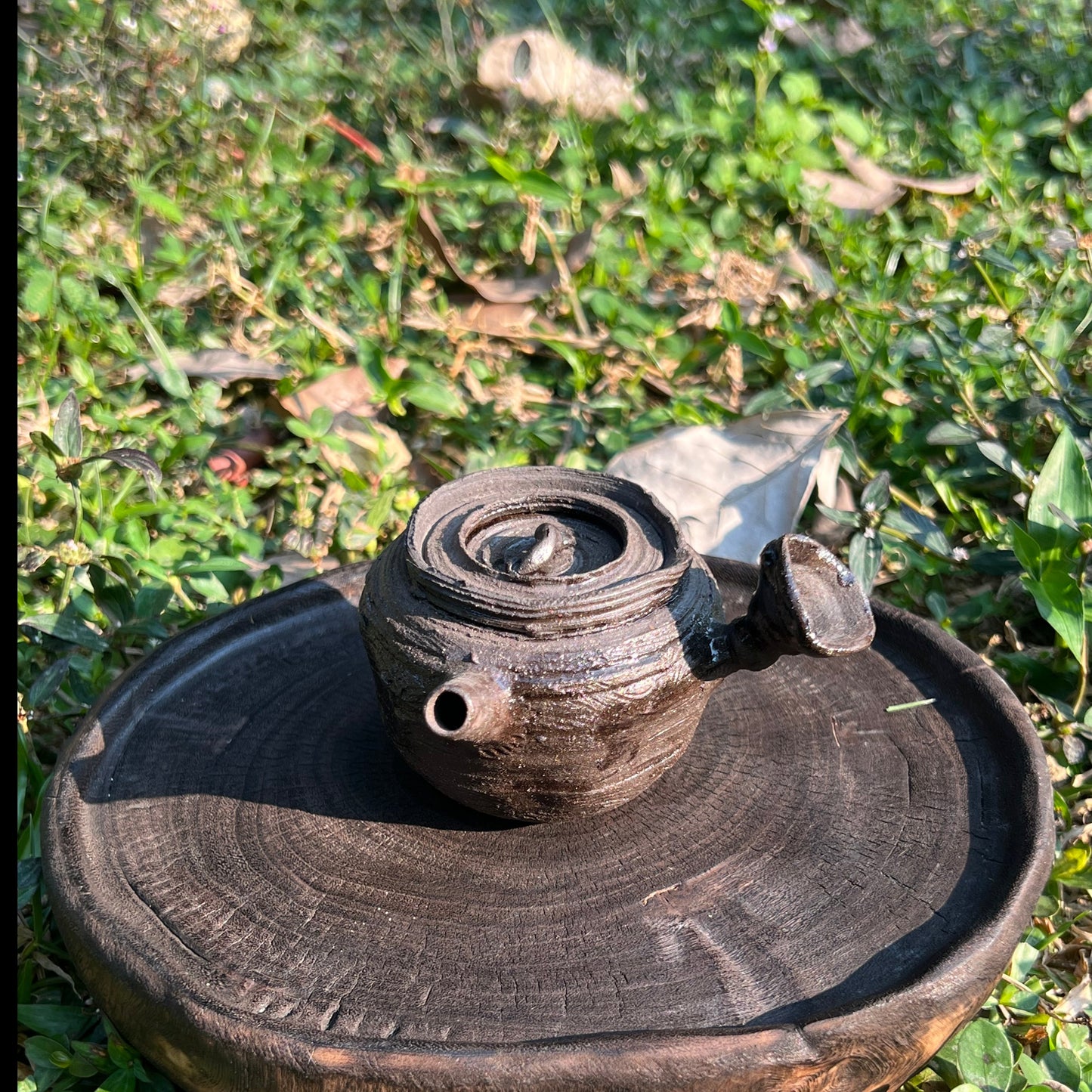 This is a purple clay teapot