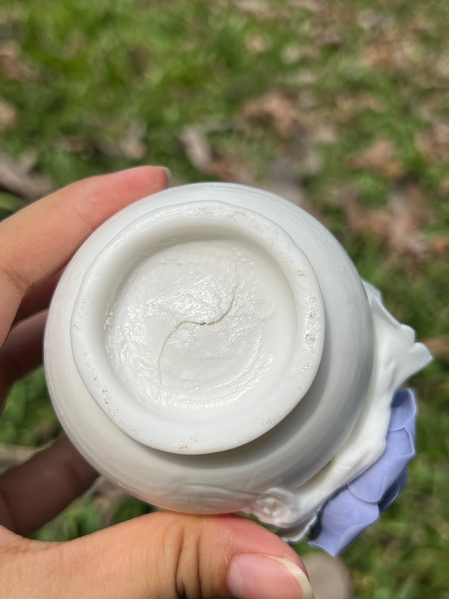 this is a woodfired white fine pottery flower teacup